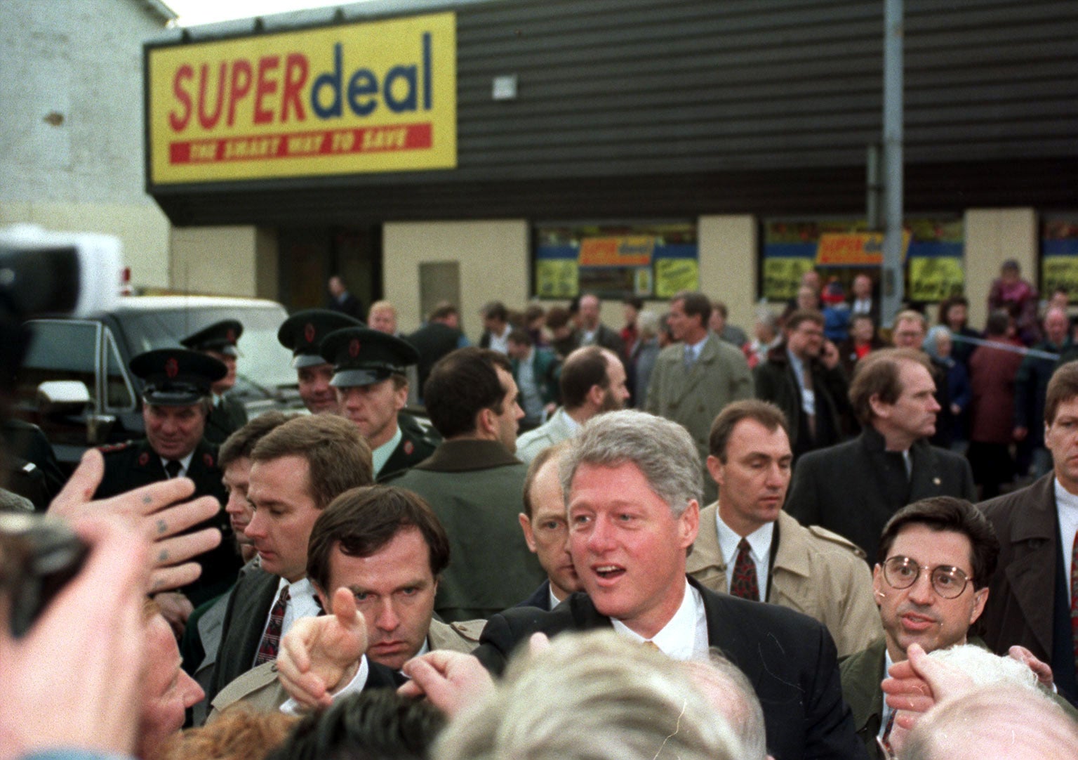 Bill Clinton shook hands with the public on the Shankhill Road during his 1995 visit (Adam Butler/PA)