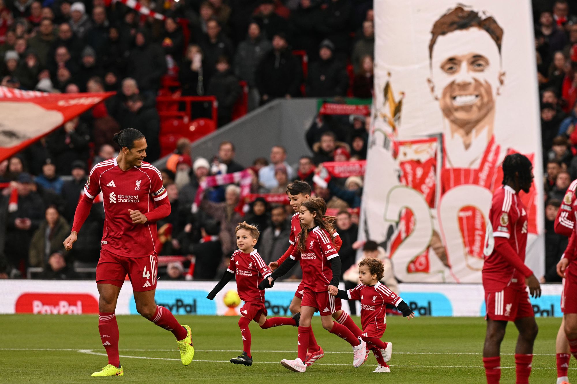 The sons of Liverpool’s late Portuguese forward Diogo Jota, Dinis and Duarte, and other family members take part in pre-game activities
