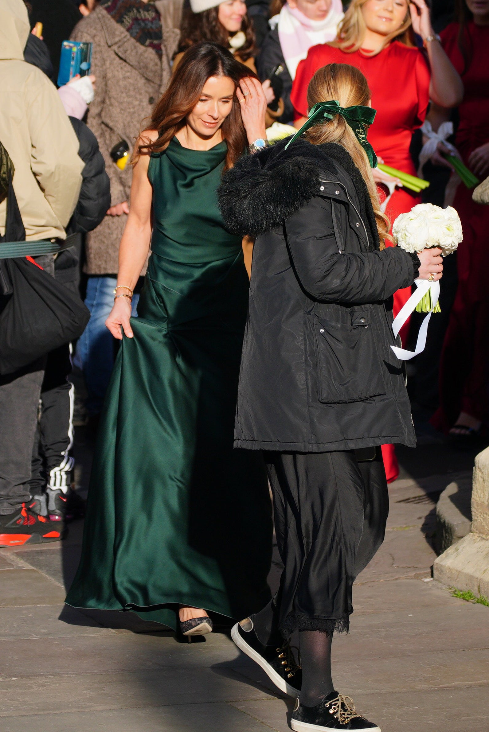 Tana Ramsay (left) arrives for the wedding of Adam Peaty and Holly Ramsay at Bath Abbey.