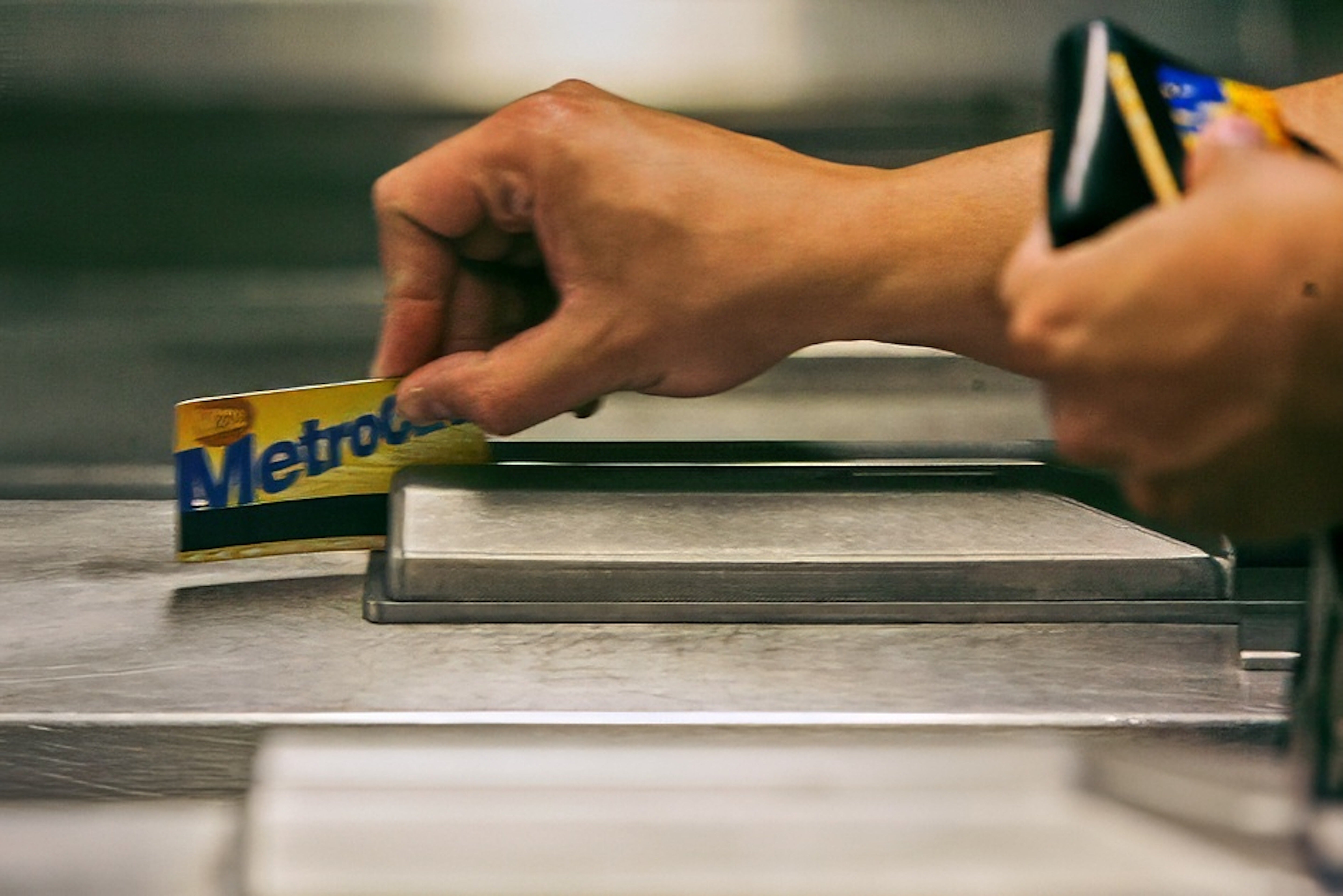 A subway rider swipes his MetroCard in a turnstile as he enters the 34th St. subway station, July 23, 2007, in New York. (AP Photo/Mary Altaffer, File) Retirement