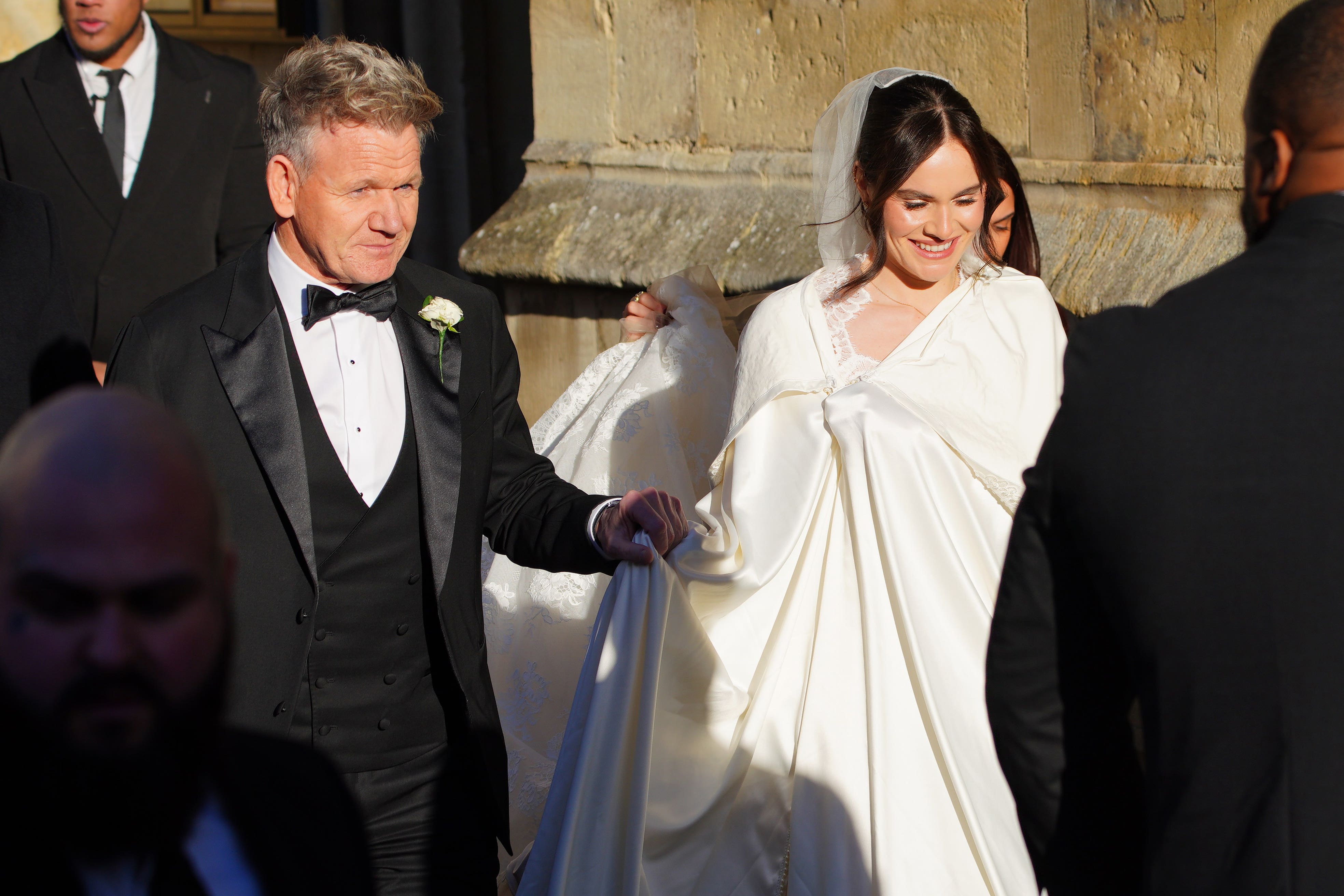 Celebrity chef Gordon Ramsay walked hand-in-hand with his 25-year-old daughter as they entered Bath Abbey for the ceremony (Ben Birchall/PA)