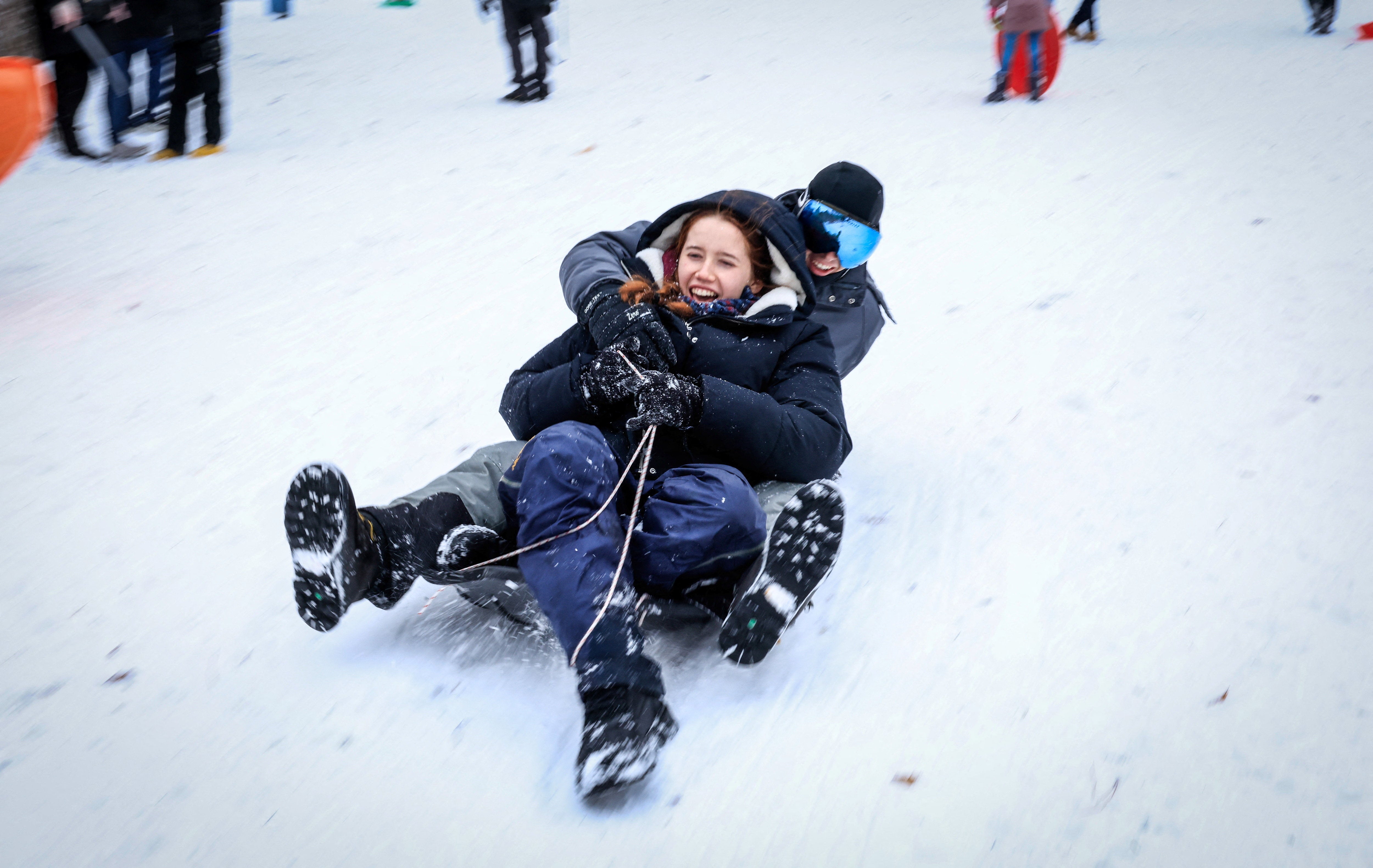 <p>People play in the snow in Central Park in Manhattan, New York</p>