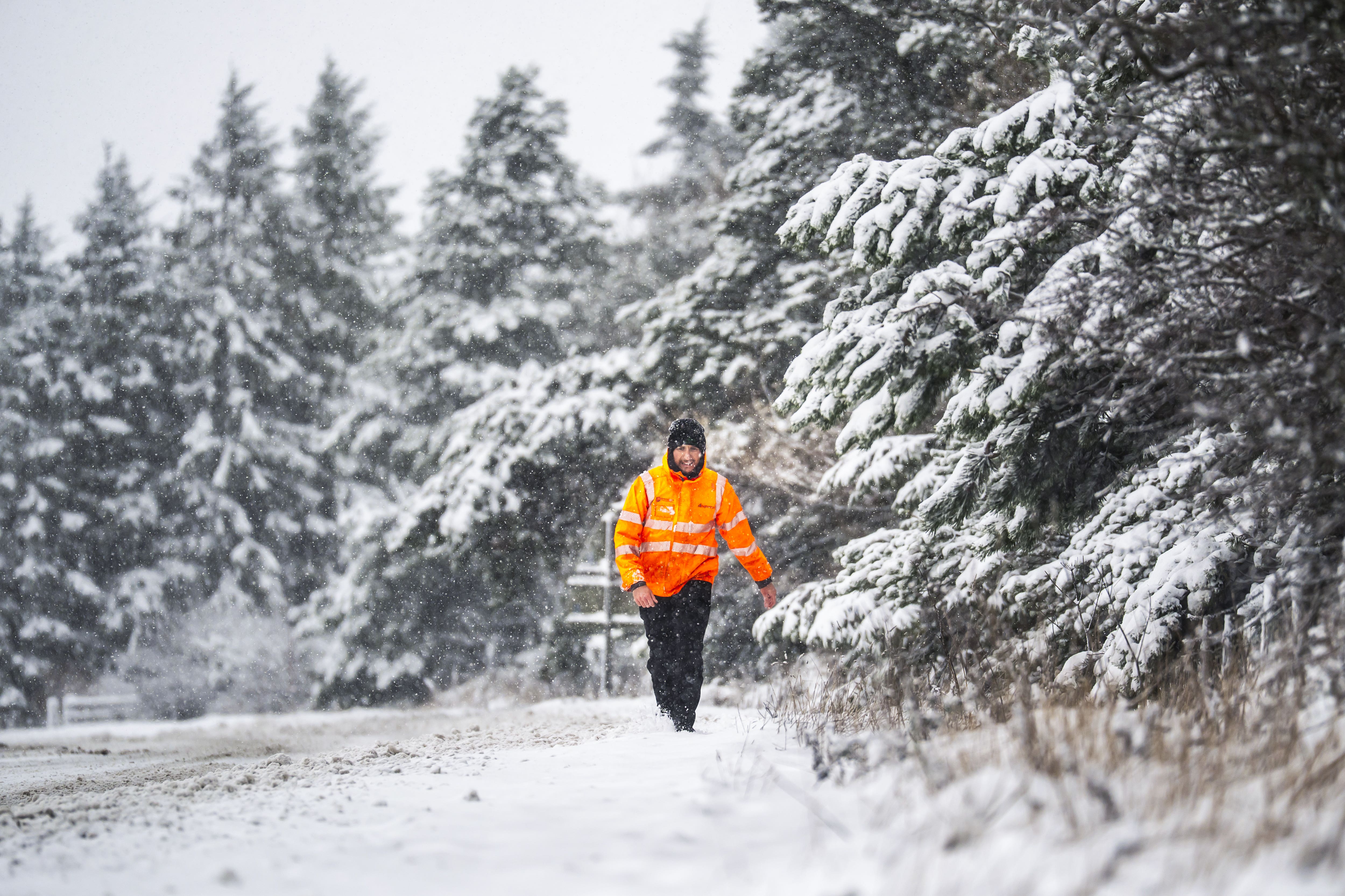 A National Highways employee on the A169 in the North York Moors in November. (Danny Lawson/PA)