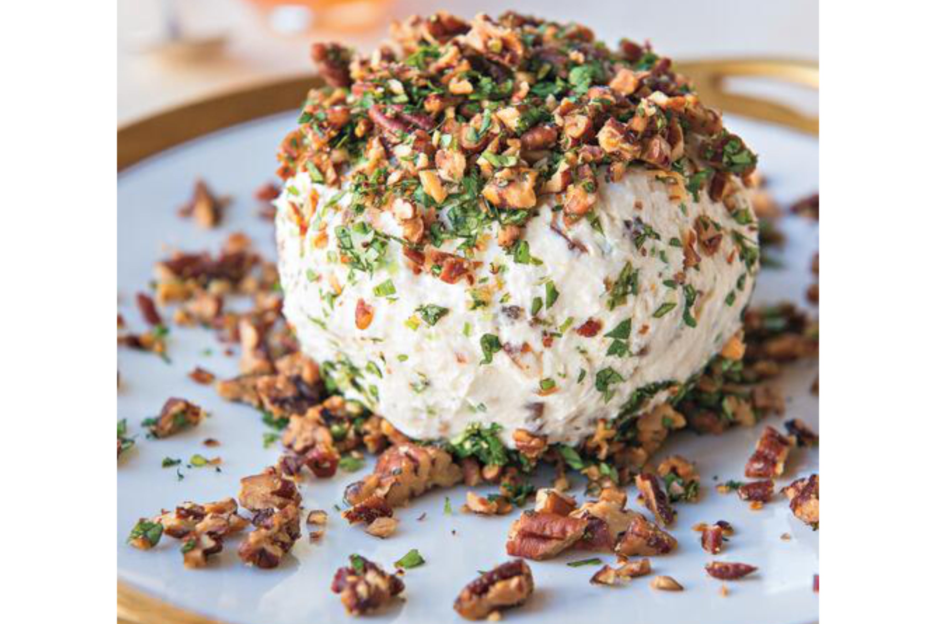 A cheese ball recipe from the cookbook Deep Run Roots: Stories and Recipes from My Corner of the South by Vivian Howard