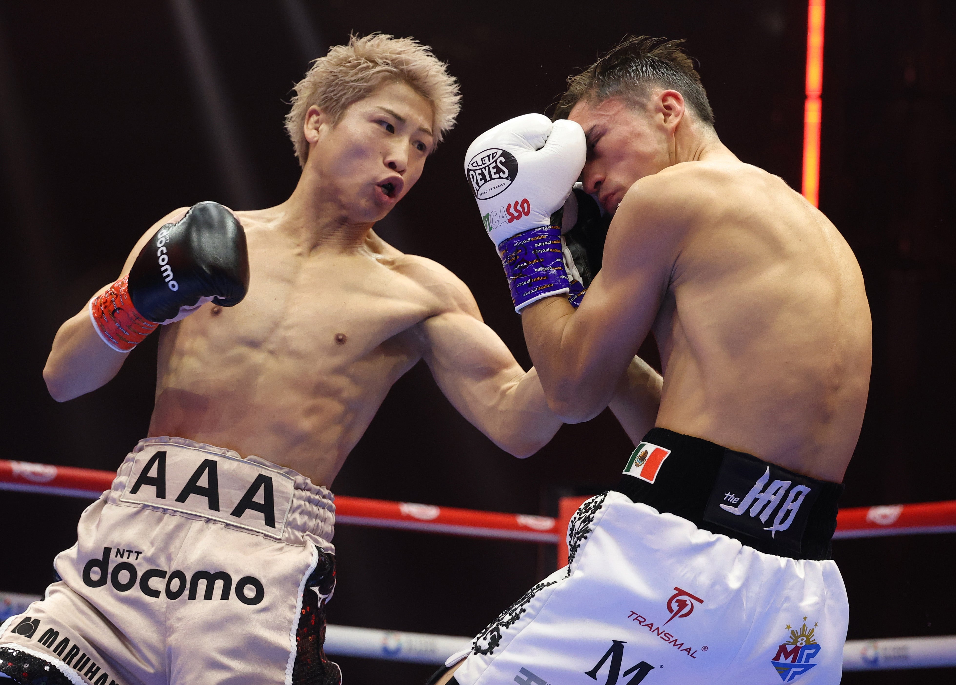 Naoya Inoue (left) during his dominant win over Alan Picasso
