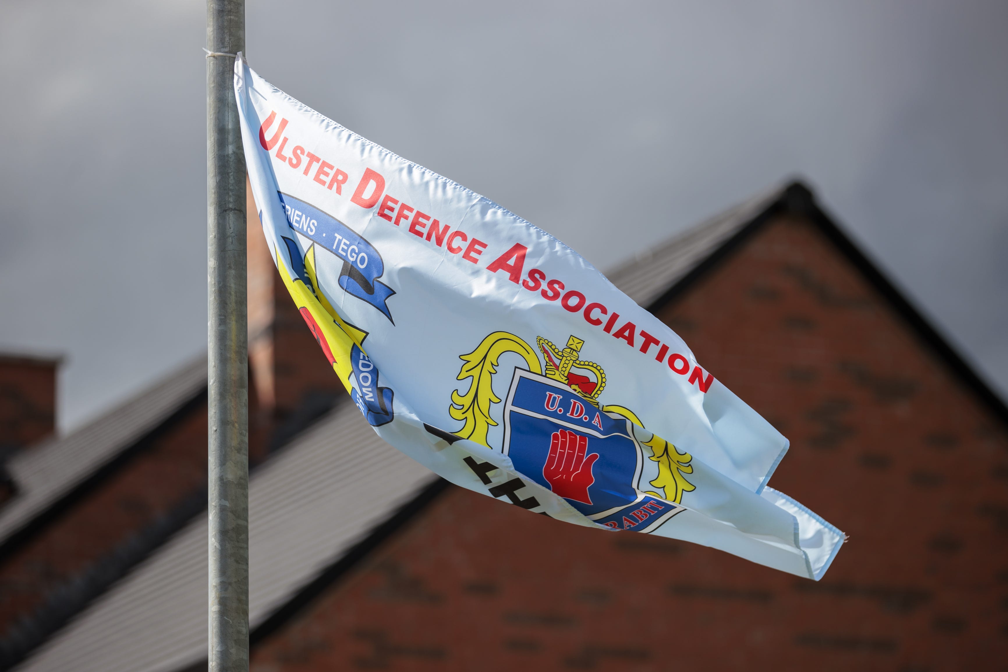 A meeting in 2004 discussed how to tackle the issue of paramilitary flags (Liam McBurney/PA)