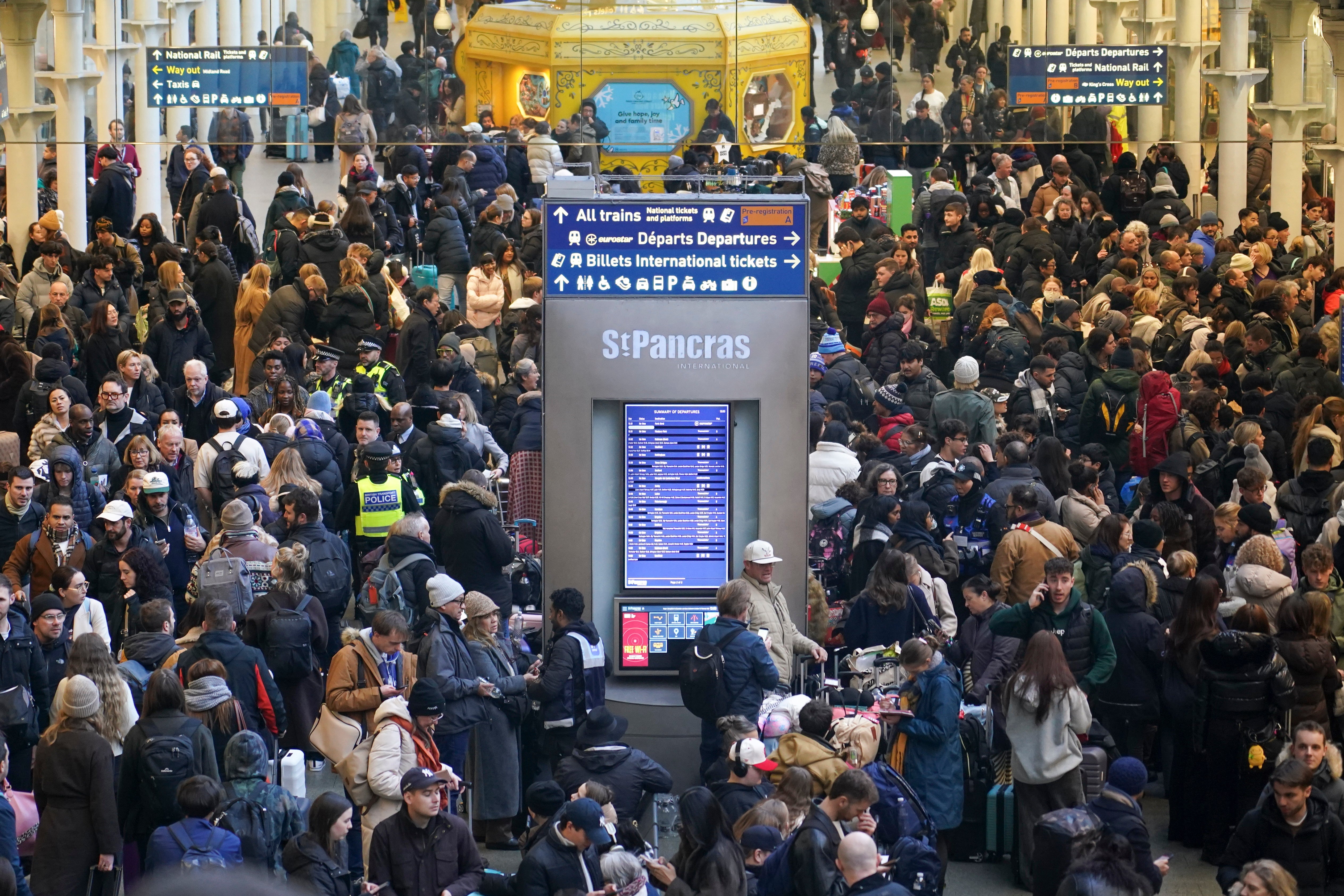 Travellers queue for Eurostar services at London’s St Pancras International station on Tuesday