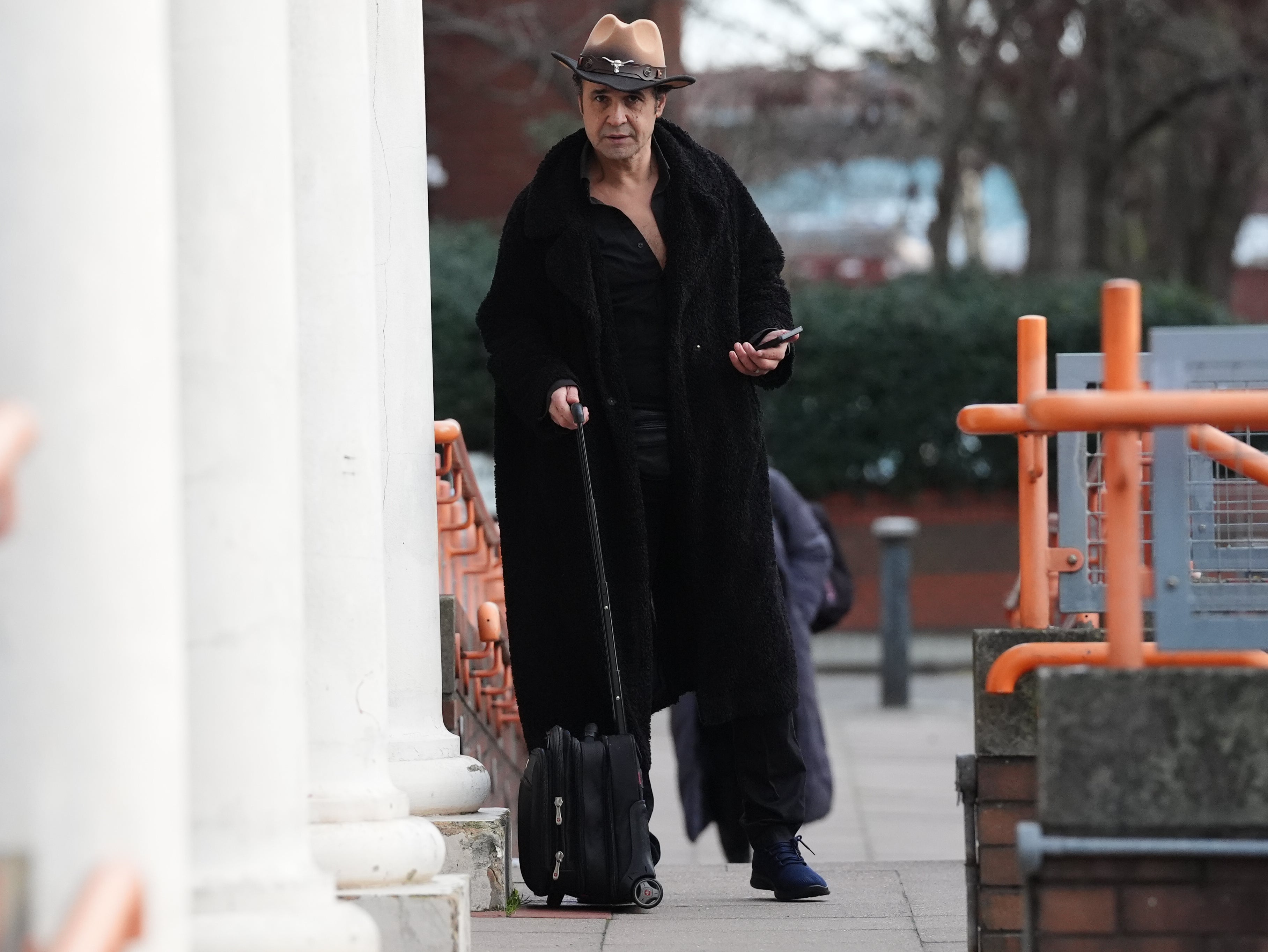 Slimani arrives at Willesden Magistrates’ Court on Tuesday