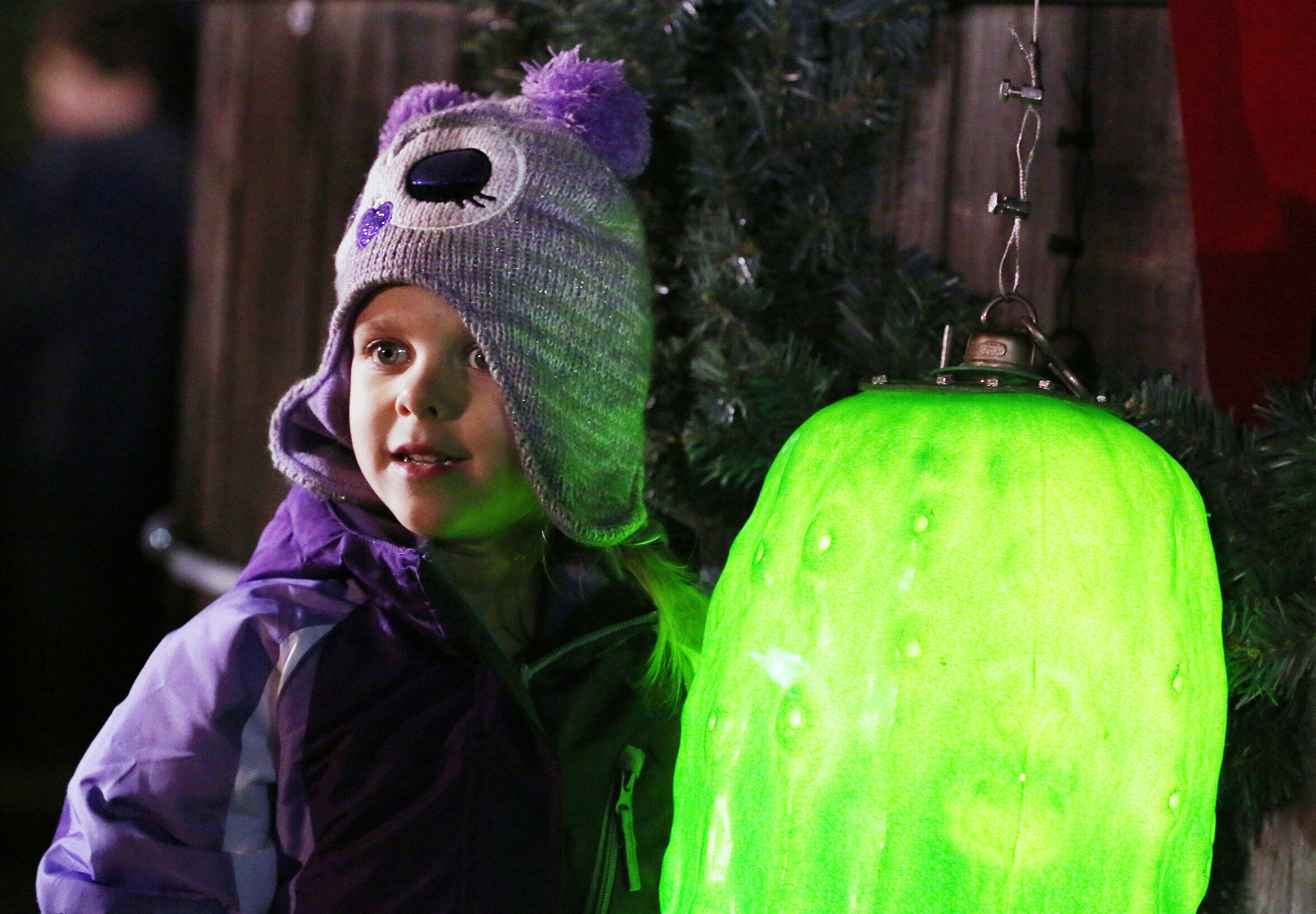 <p>Mt. Olive, North Carolina, celebrates its local pickle brand by dropping a glittery green pickle, almost 1.8 meters long</p>