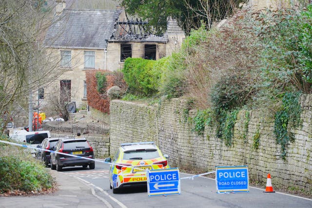Emergency services at the scene in Brimscombe Hill, near Stroud after a house fire (Ben Birchall/PA)