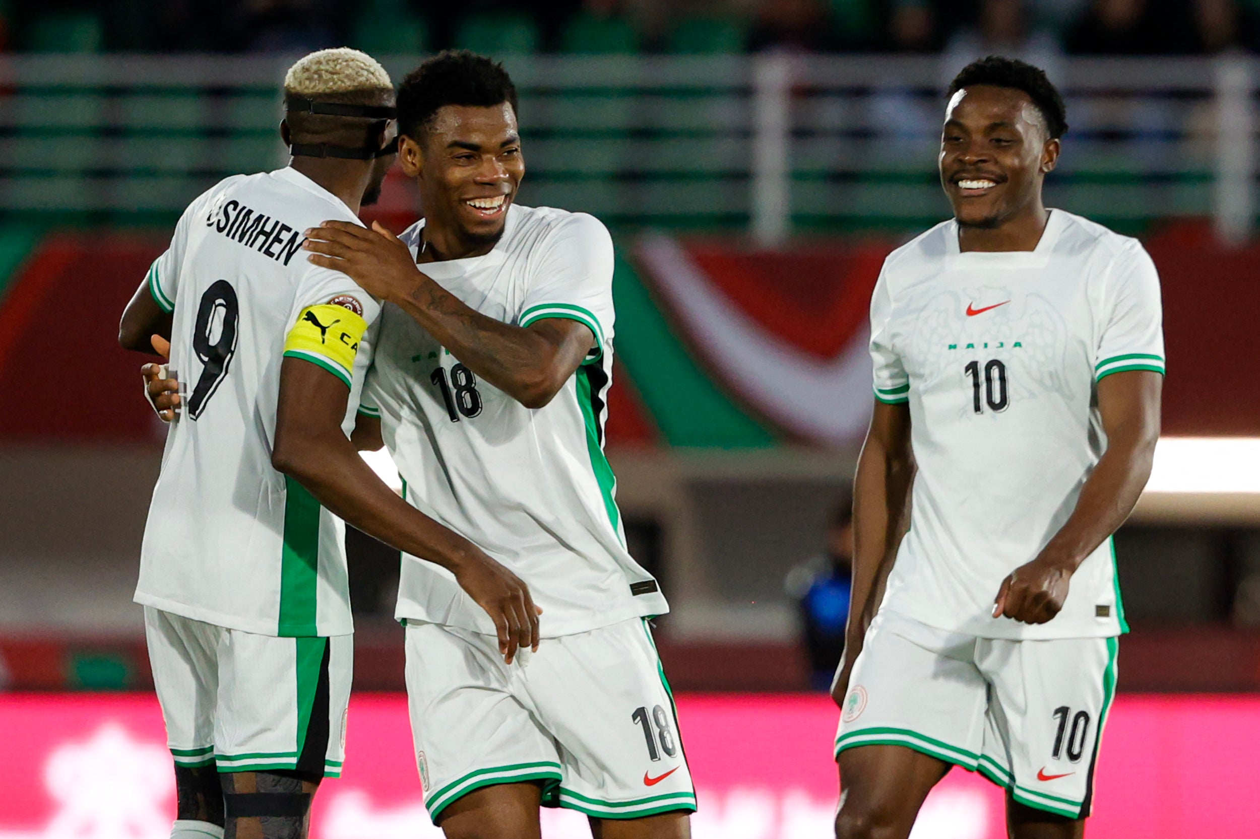Nigeria's midfielder #18 Raphael Onyedika celebrates scoring