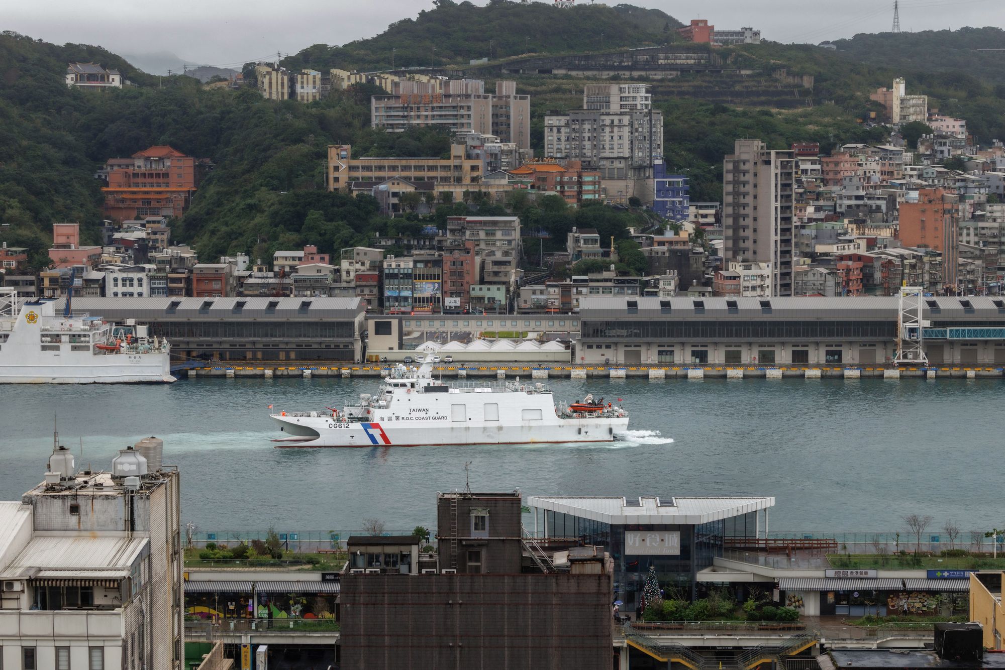 Taiwanese Coast Guard Administration (CGA) vessel Su'ao (CG612) sails at the Keelung Harbour in Keelung on 30 December 2025, amid Chinese military drills around Taiwan
