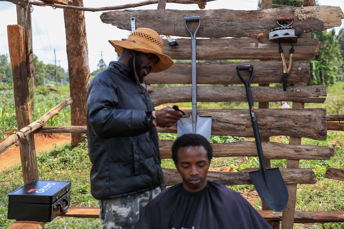 Meet the TikTok-famous barber using a shovel and an iron to cut hair