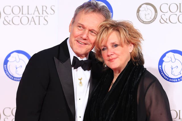 <p>Sarah Fisher, pictured with partner Anthony Head, has died aged 61</p>