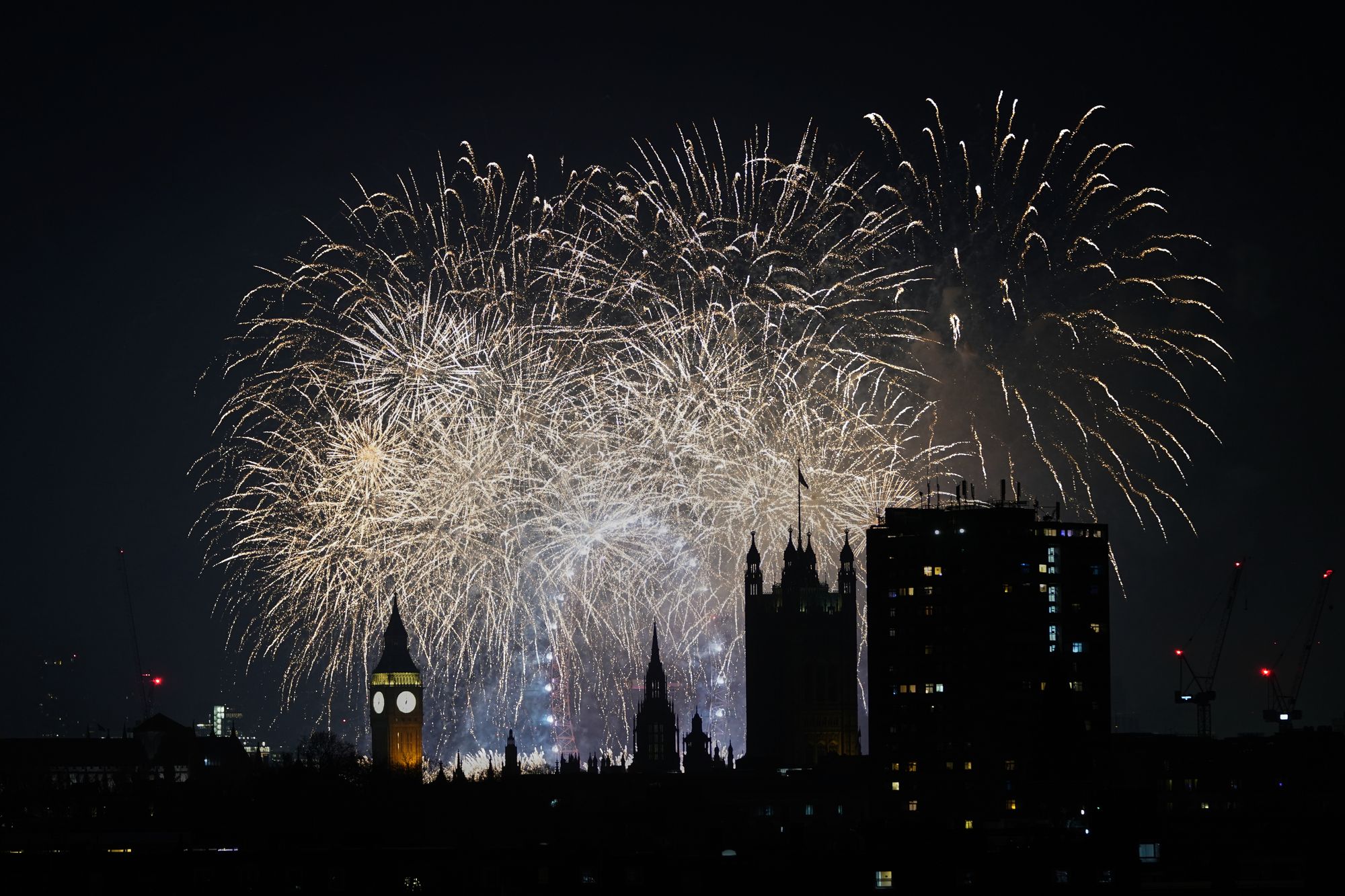 Fireworks light-up the sky in central London to celebrate the New Year on Thursday