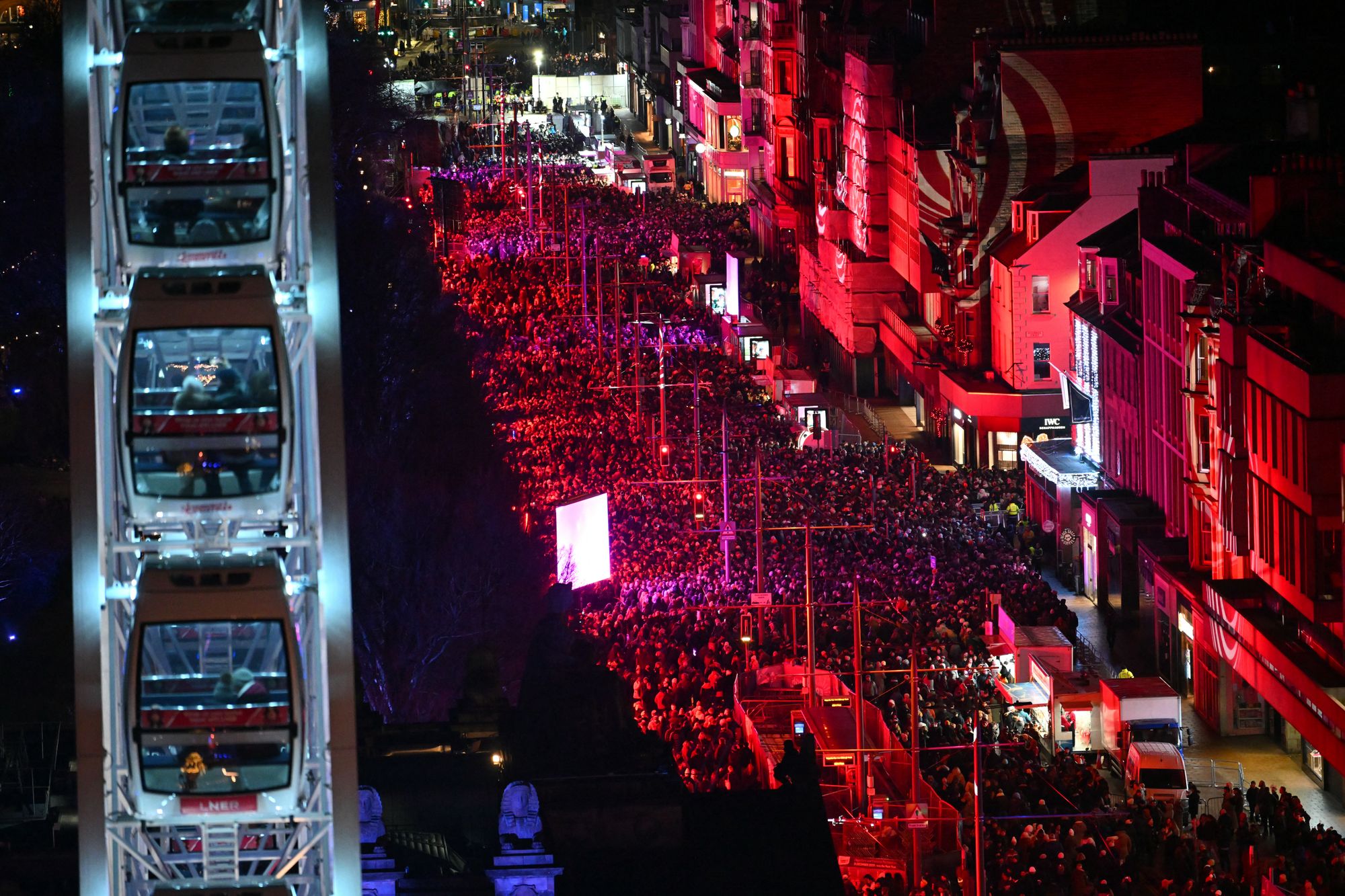 People crowd Princes Street during the Hogmanay street party to see in the New Year in Edinburgh on 31 December 2025