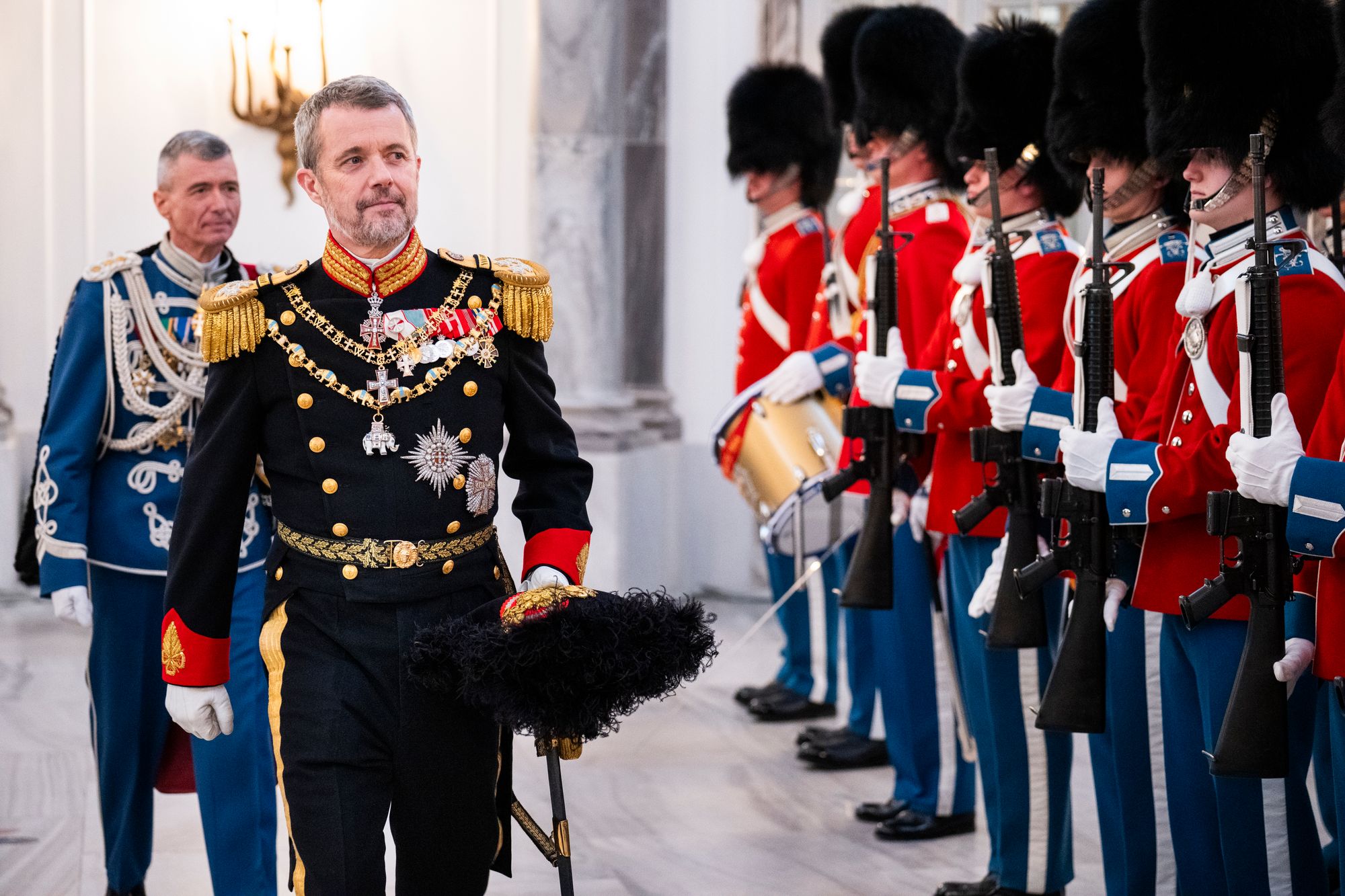 King Frederik X, shown here inspecting troops in Copenhagen, visited Greenland in May 2025 amid rising tensions with the U.S.