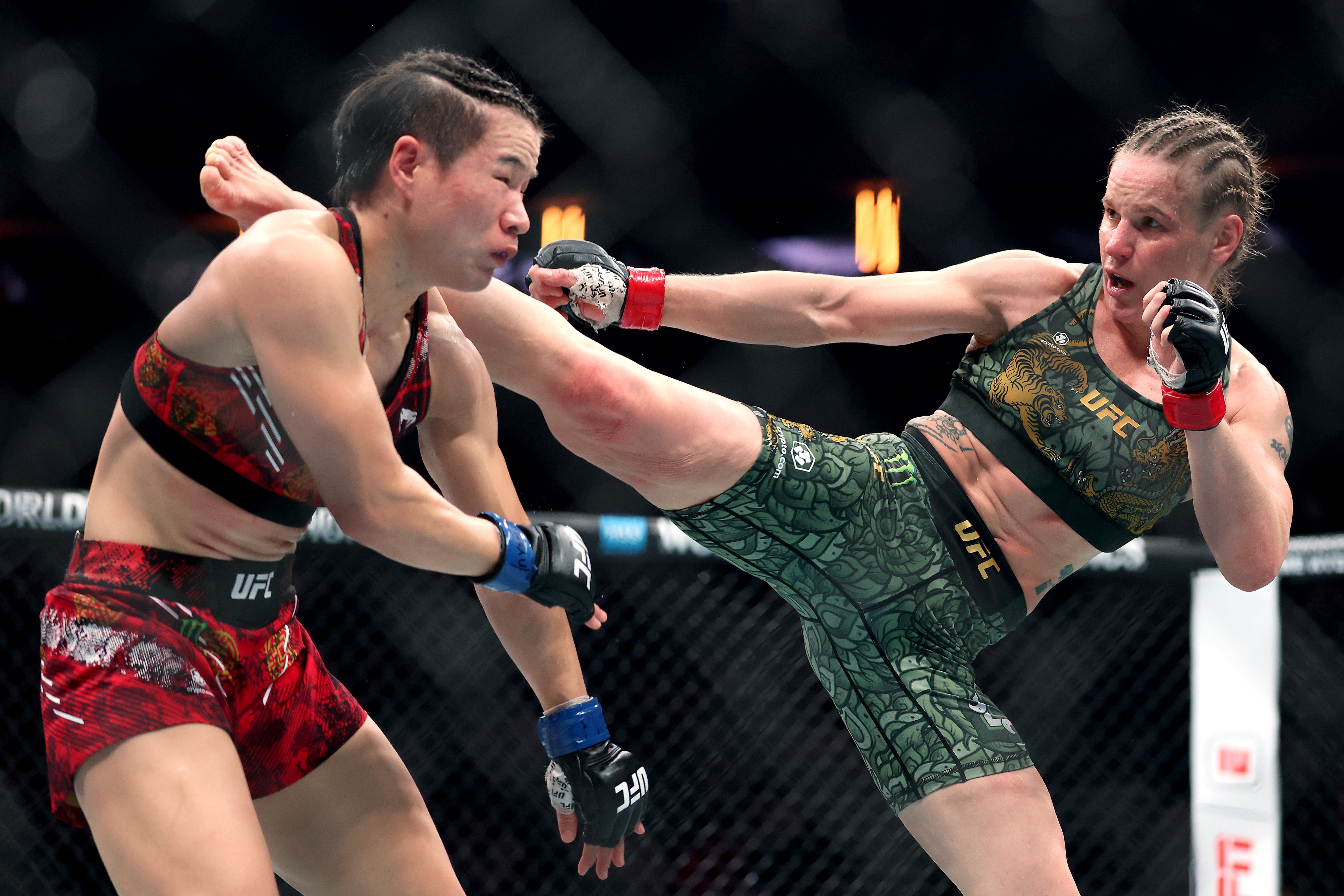 Valentina Shevchenko (right) in her super-fight victory over Zhang Weili