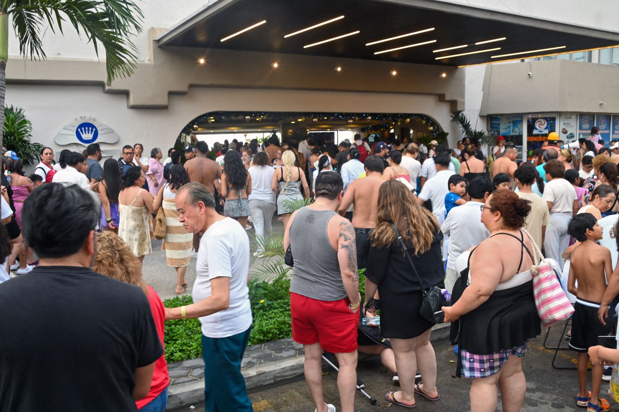 Tourists shown outside of their hotel in Mexico City after the earthquake struck in the early hours