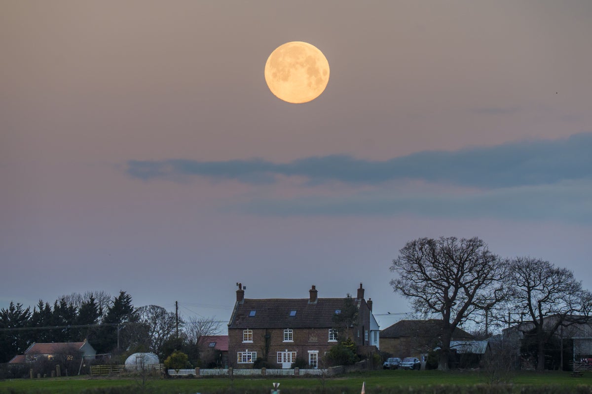 Wolf supermoon appears in clear UK skies