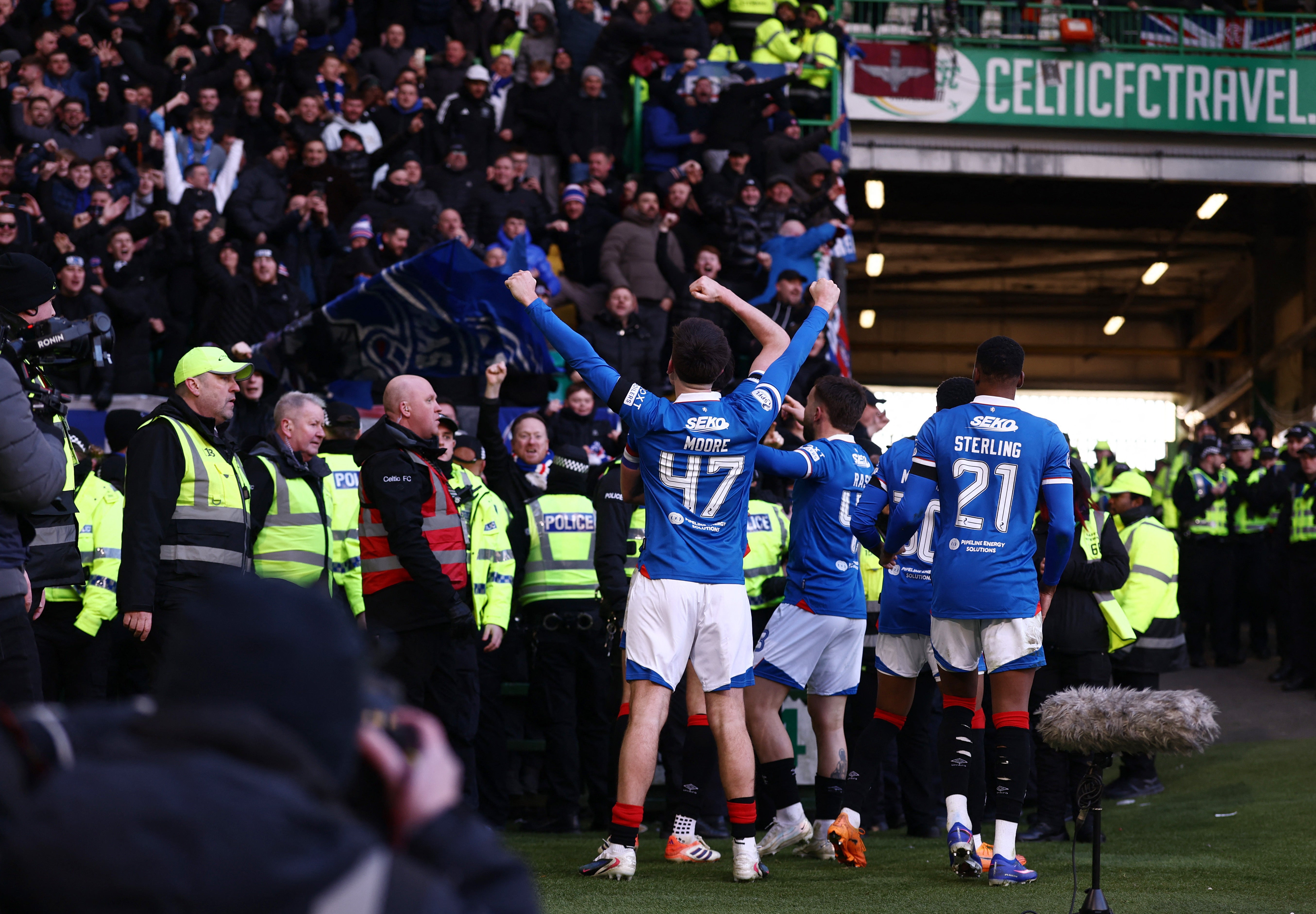 Rangers players celebrate wildly after flipping the Old Firm tie on its head