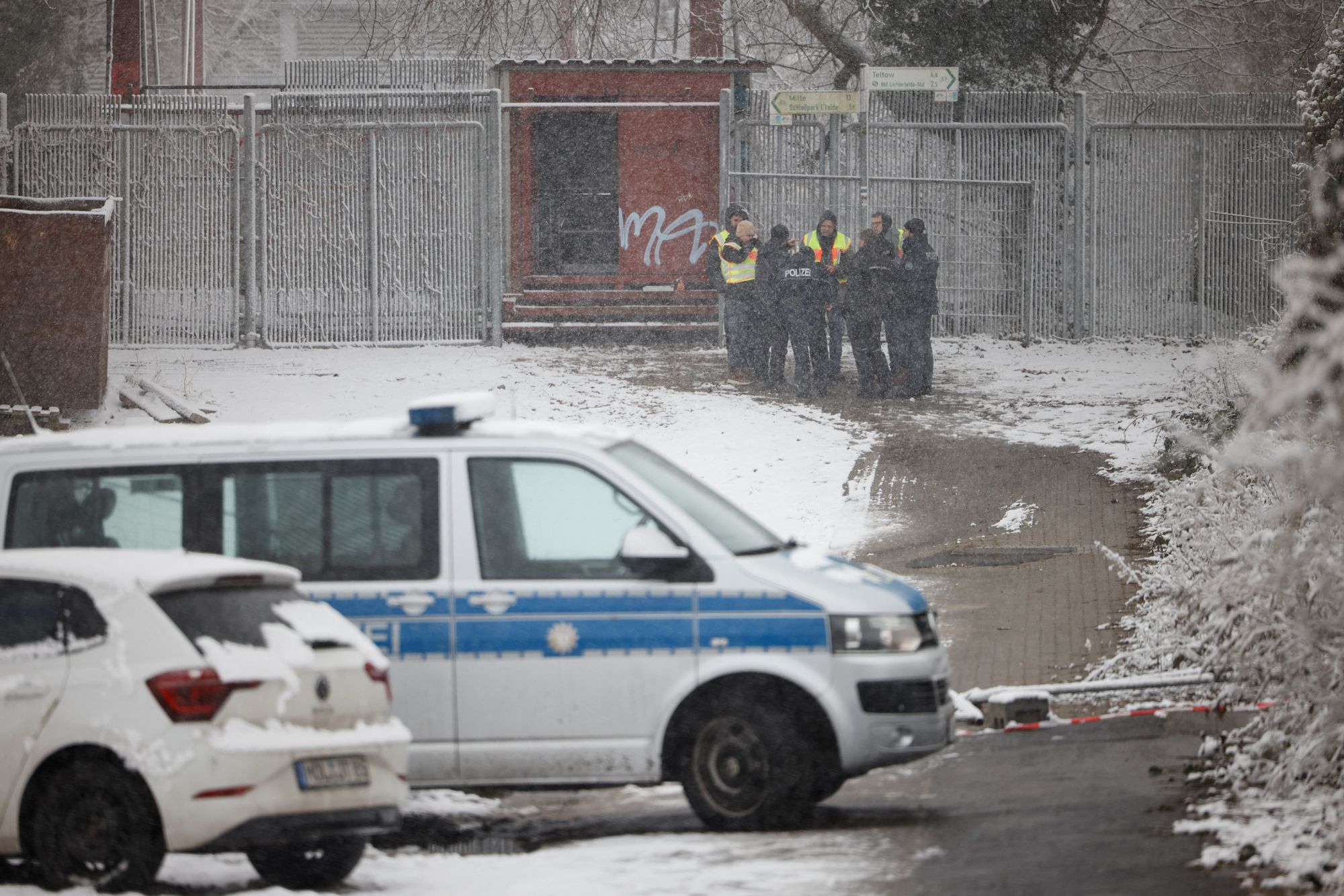 <p>Police officers stand guard in front of a power distribution system that caught fire, causing a blackout in parts of the city, in Berlin, Germany, January 3, 2026</p>