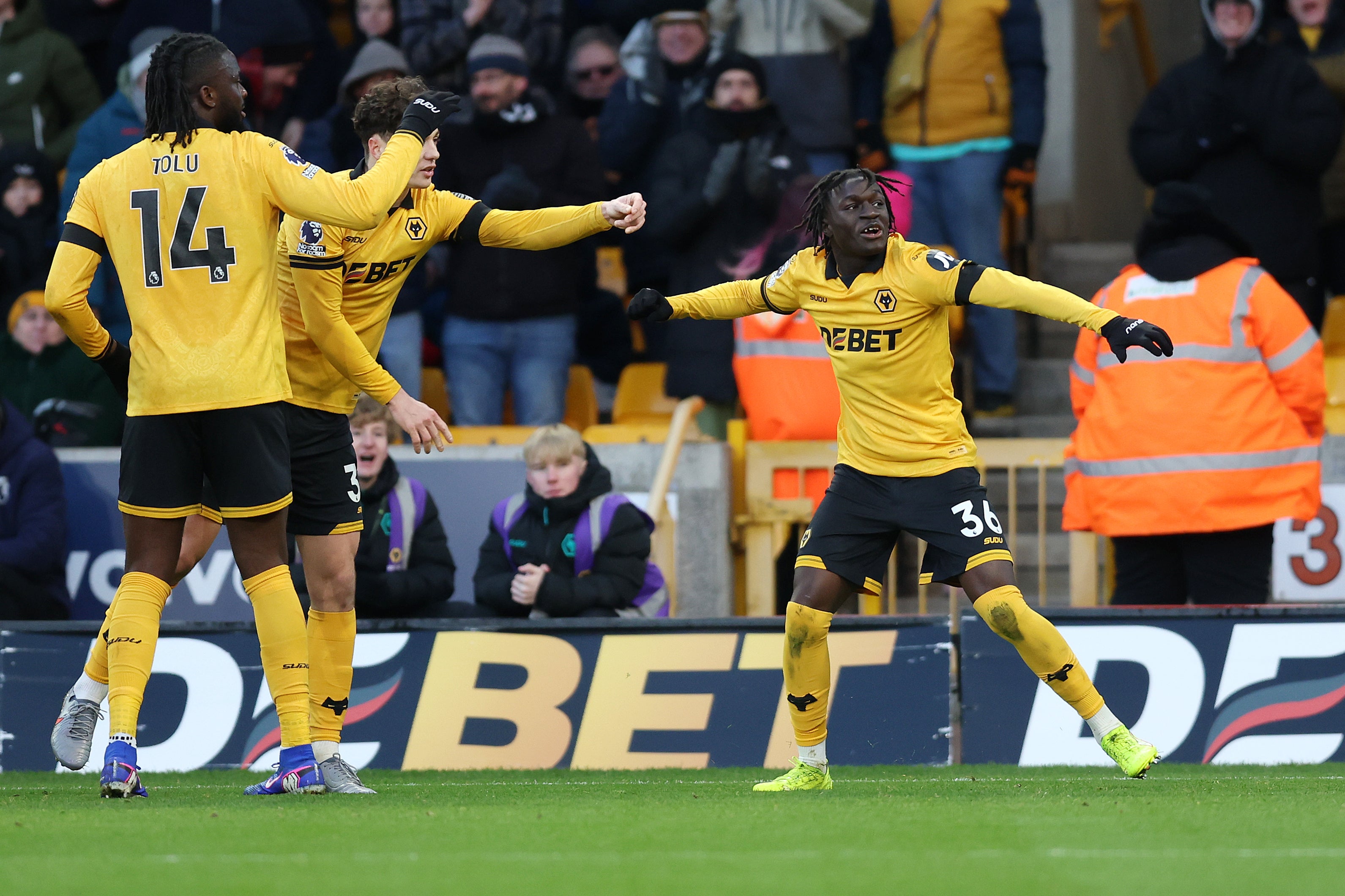 Wolverhampton Wanderers' Mateus Mane (right) celebrates scoring his side's third