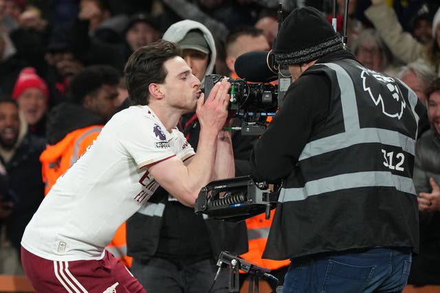<p>Declan Rice plants a kiss on the camera after bagging his second goal against Bournemouth</p>