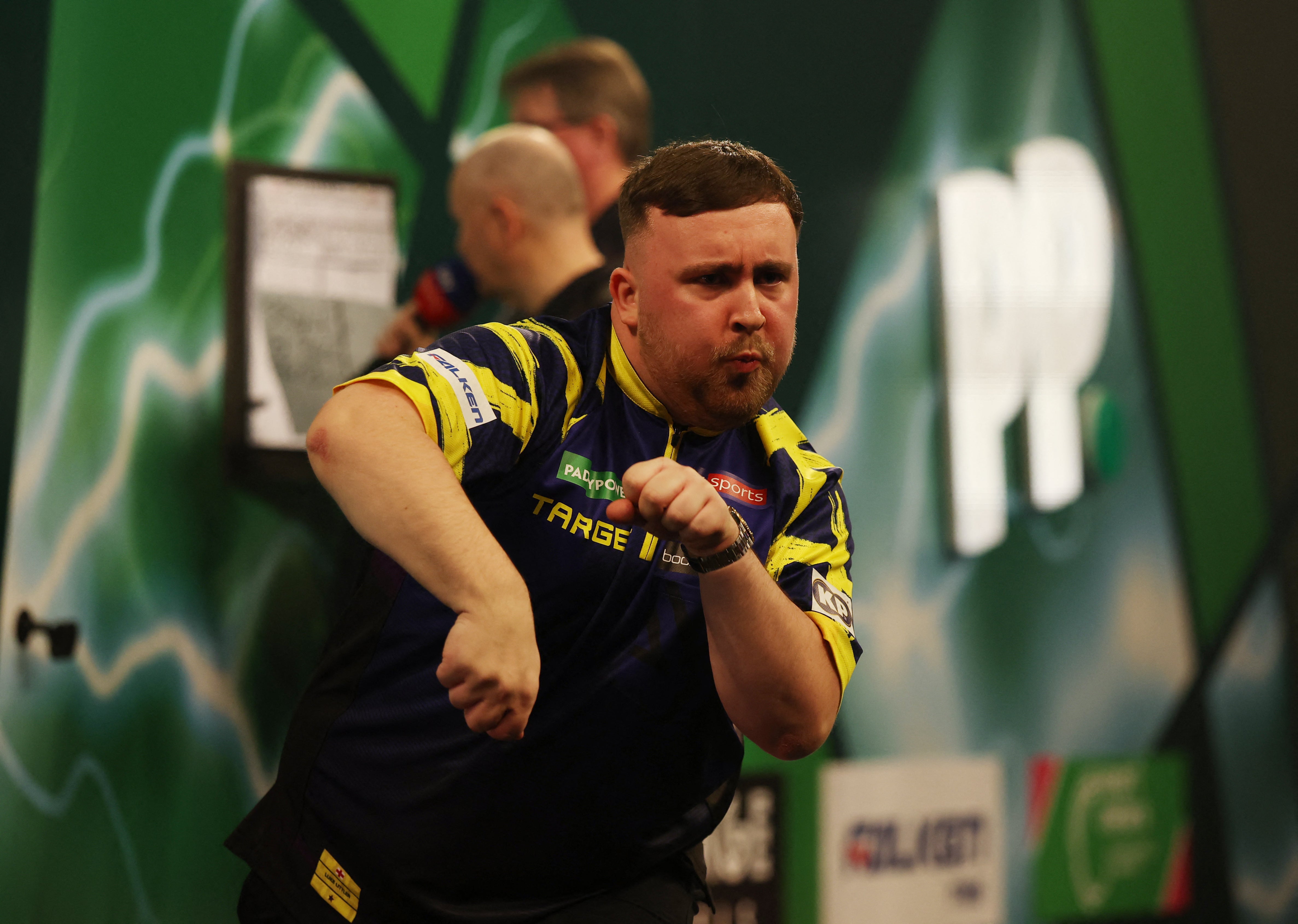 Littler delivers his big-fish celebration after taking out 170