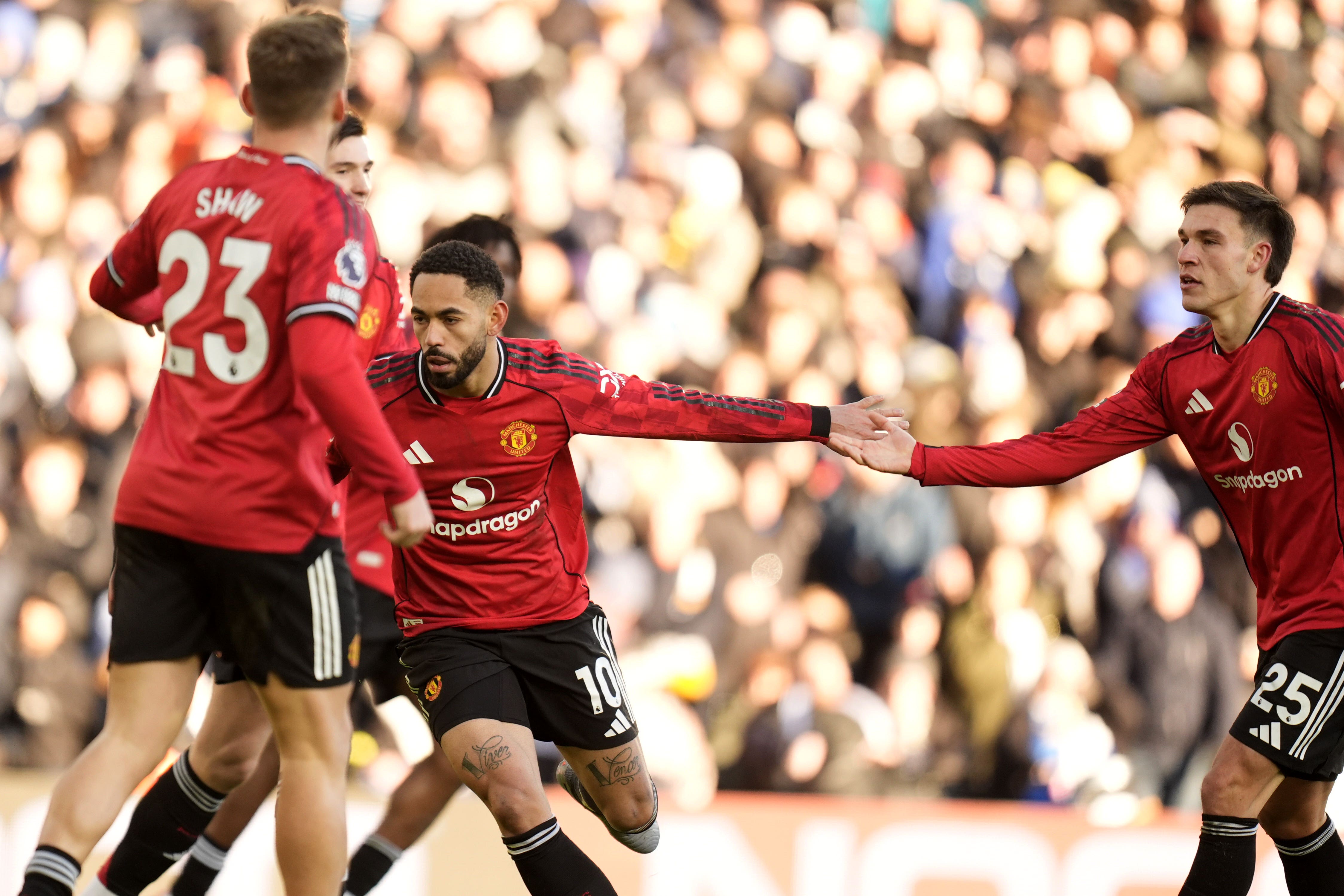 Matheus Cunha (centre) celebrates Manchester United’s equaliser in a 1-1 draw at Leeds (Danny Lawson/PA).