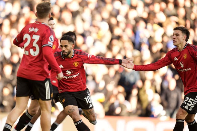 Matheus Cunha (centre) celebrates Manchester United’s equaliser in a 1-1 draw at Leeds (Danny Lawson/PA).