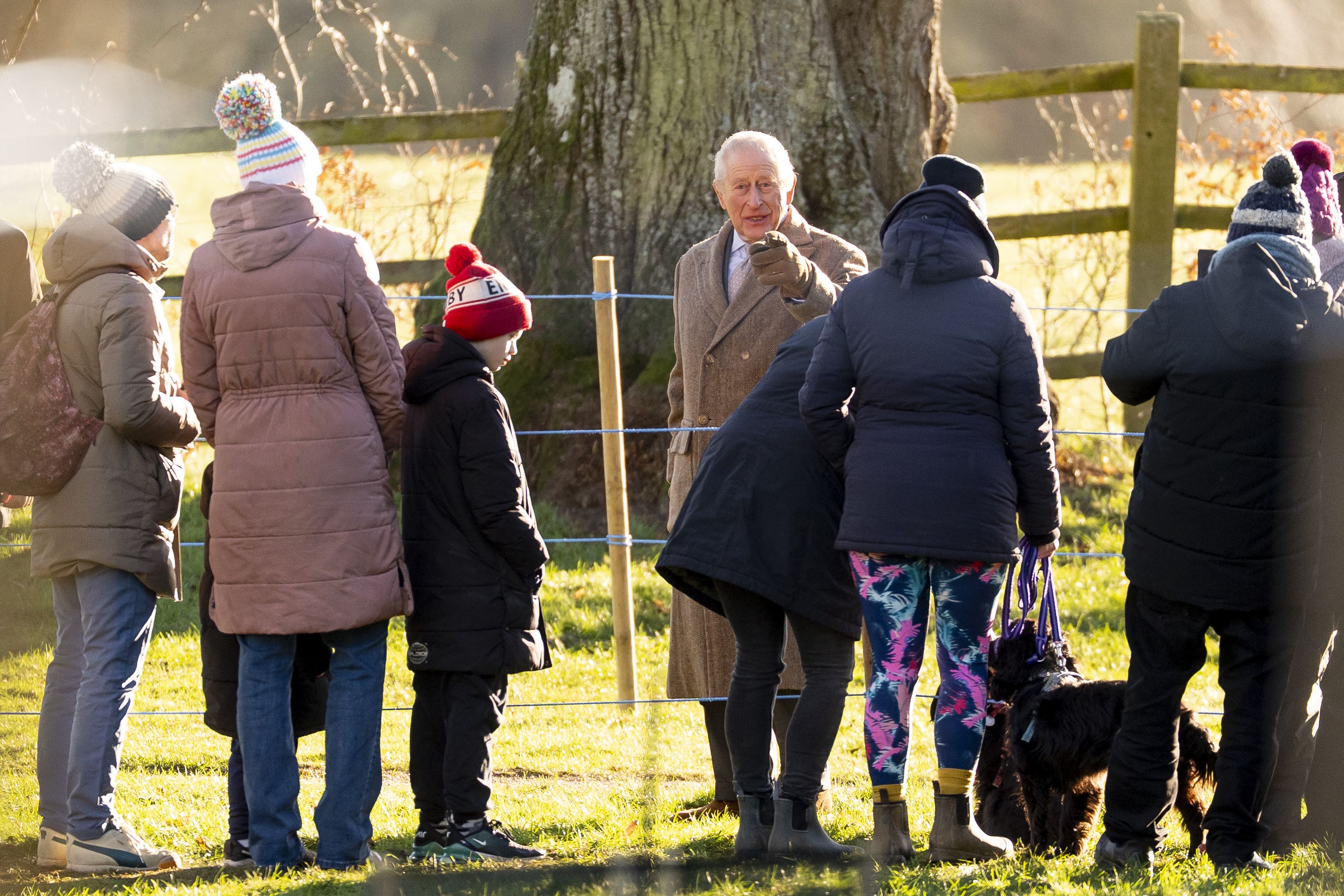 The King chatted to people as he left the Sunday service at St Mary Magdalene Church (Aaron Chown/PA)