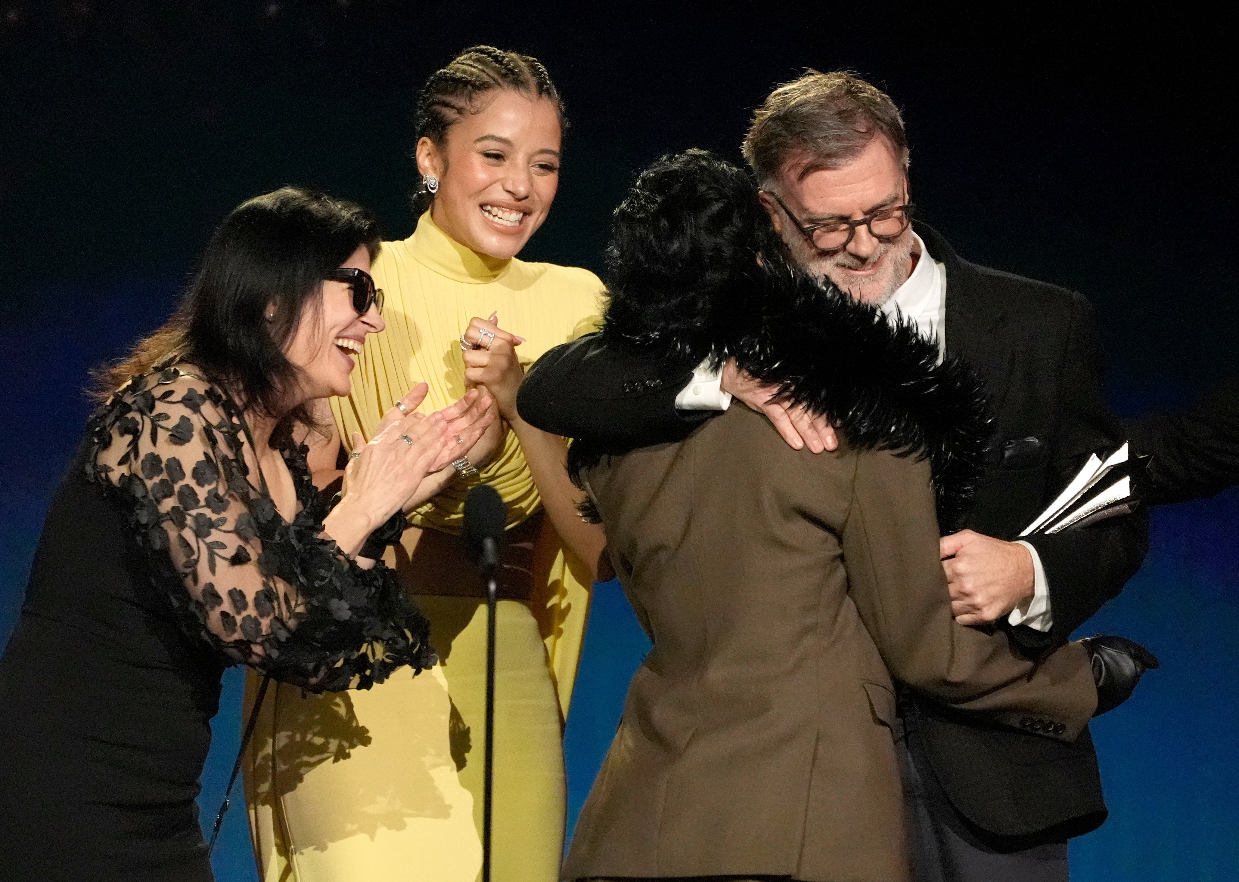 From left, Cassandra Kulukundis, Chase Infiniti, Teyana Taylor, and Paul Thomas Anderson accept the award for best picture for ‘One Battle After Another’