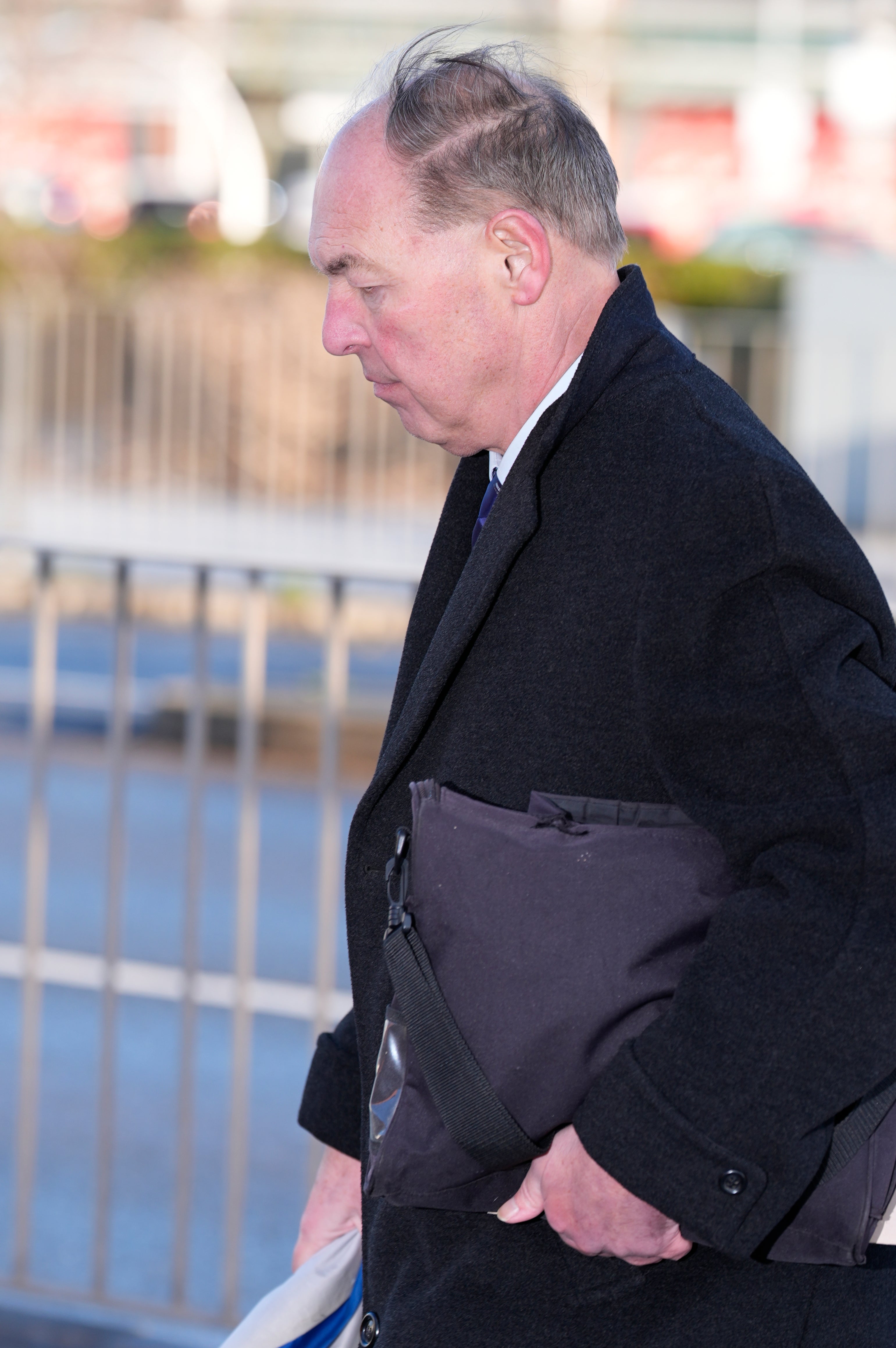 <p>Jonathan Carley pictured arriving at court after allegedly dressing up as a high-ranking navy officer </p>