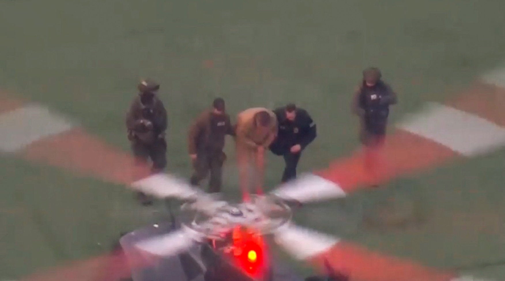 An aerial view shows Maduro being moved from a vehicle to helicopter, as he heads to the Daniel Patrick Moynihan Manhattan United States Courthouse