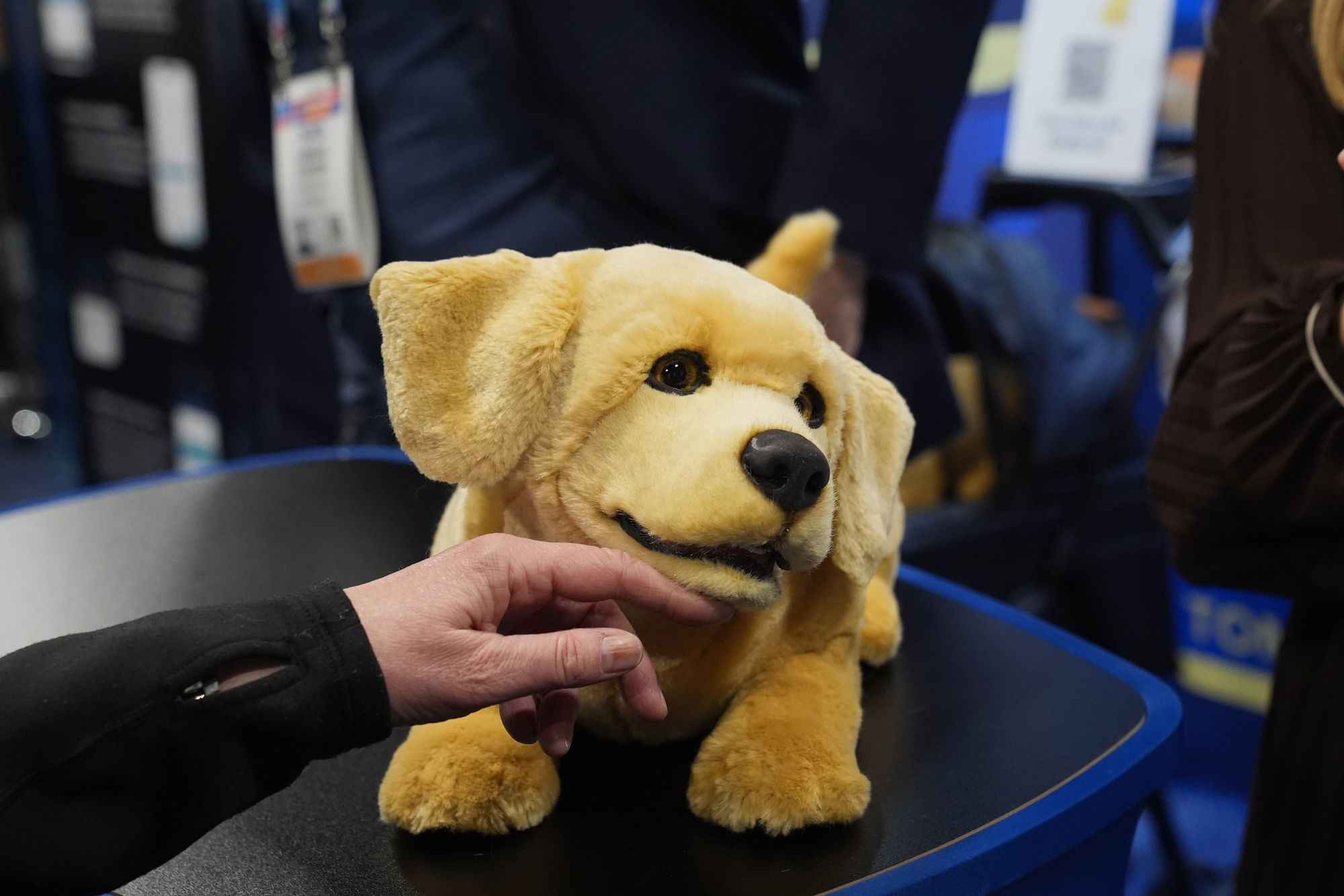 A Tombot robotic puppy is pictured at a Tombot booth during the CES Unveiled tech show Sunday, Jan. 4, 2026, in Las Vegas