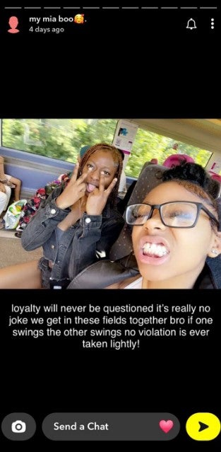 The teenagers pose for a selfie after killing Marks