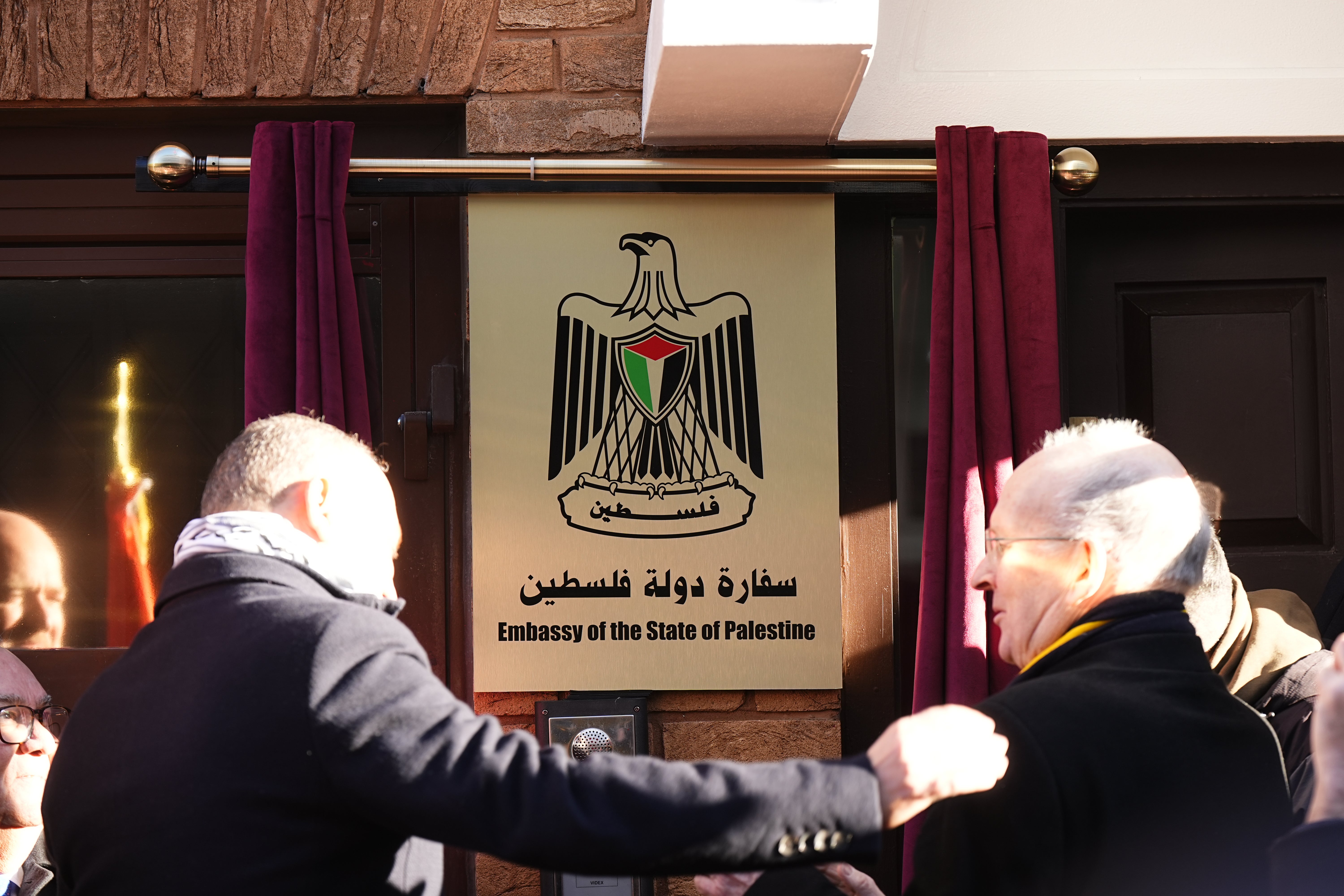<p>Palestinian Ambassador to the UK Dr Husam Zomlot (left) unveils a plaque during the inauguration (Aaron Chown/PA)</p>