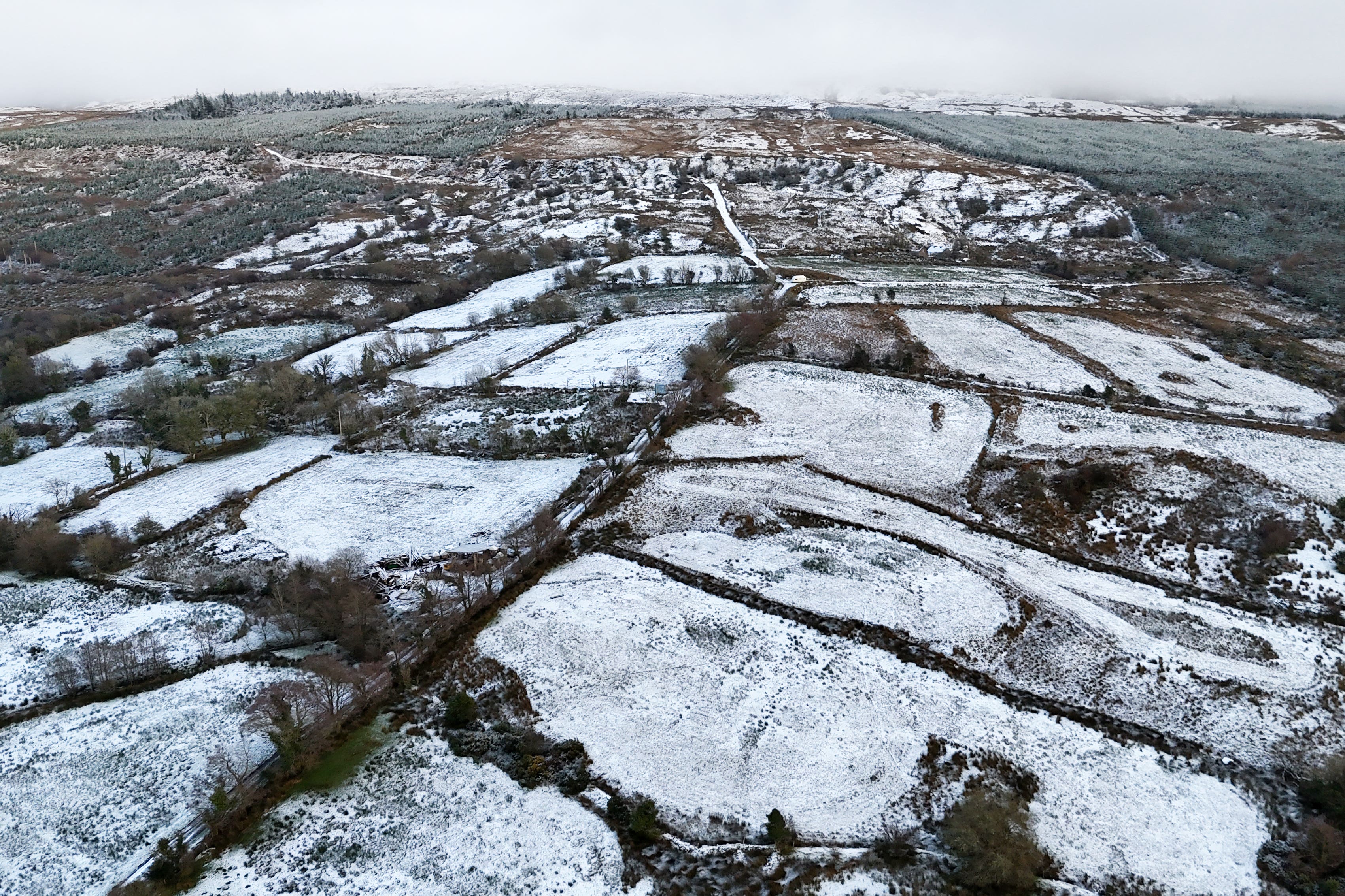 Snow covered farm land in Drumshanbo Co Leitrim (Niall Carson/PA)