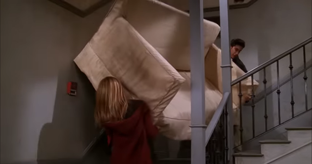 <p>Scene from Friends showing characters struggle to move a sofa</p>
