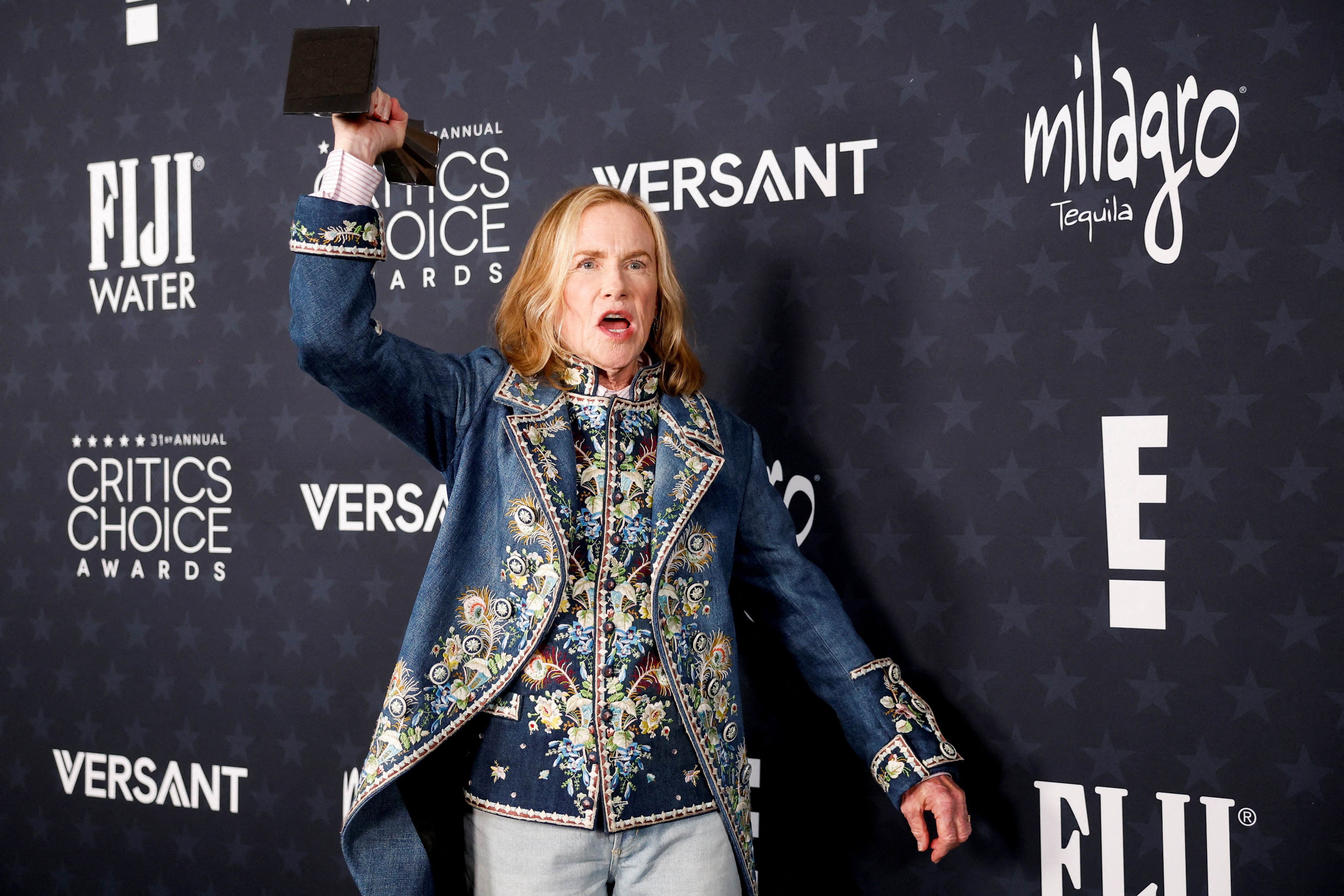 Amy Madigan poses with the Best Supporting Actress award