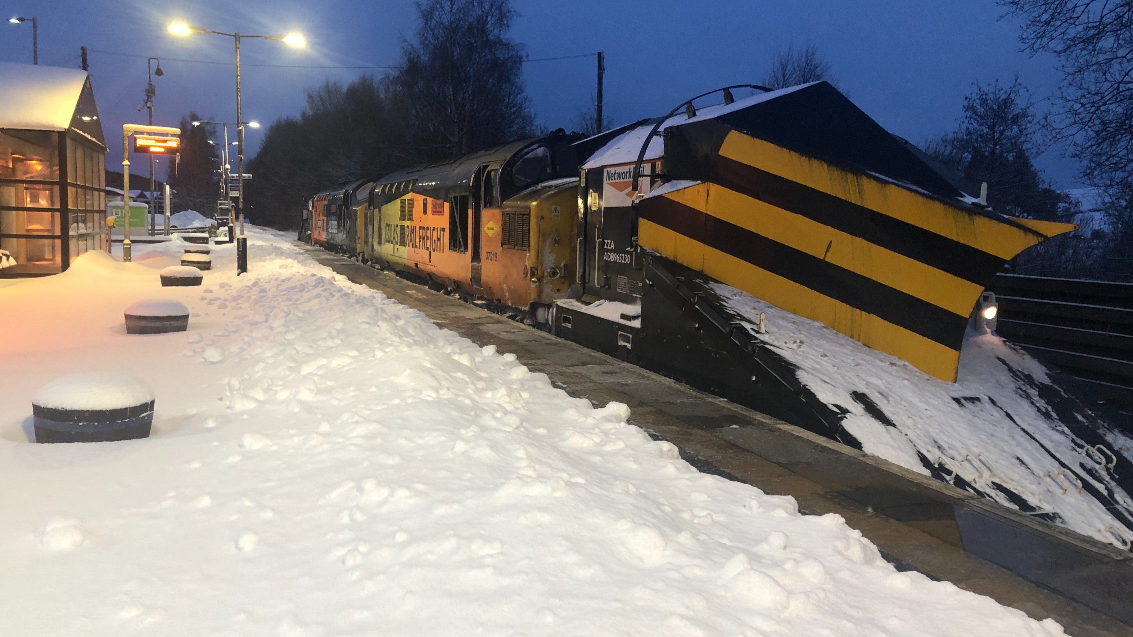 <p>Ploughing on: Network Rail snowplough at Keith station in northern Scotland</p>