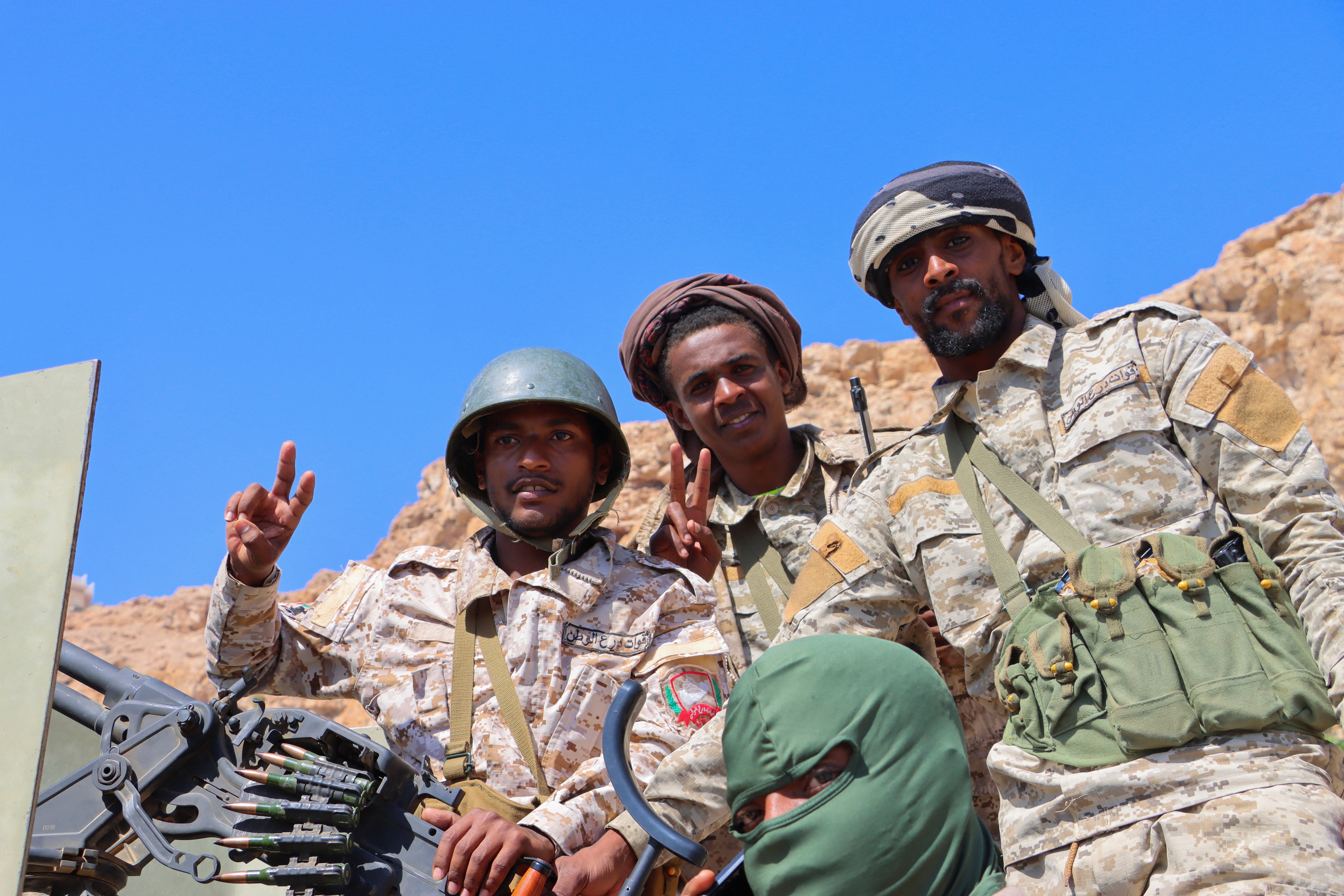 <p>Yemeni soldiers ride in the port city of Mukalla after retaking it from southern separatists</p>