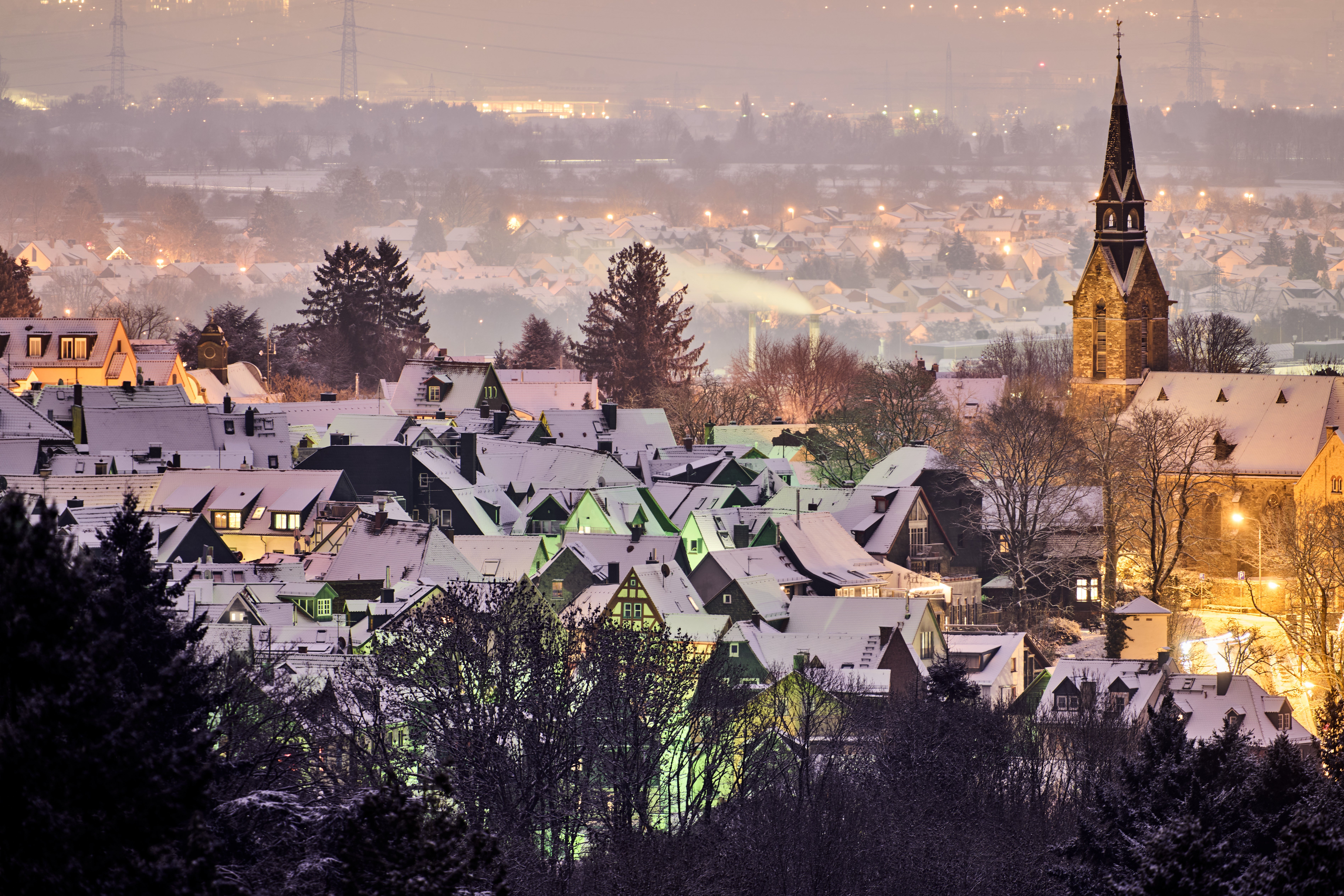 Freshly fallen snow lies on the roofs of houses in Kronberg near Frankfurt, Germany