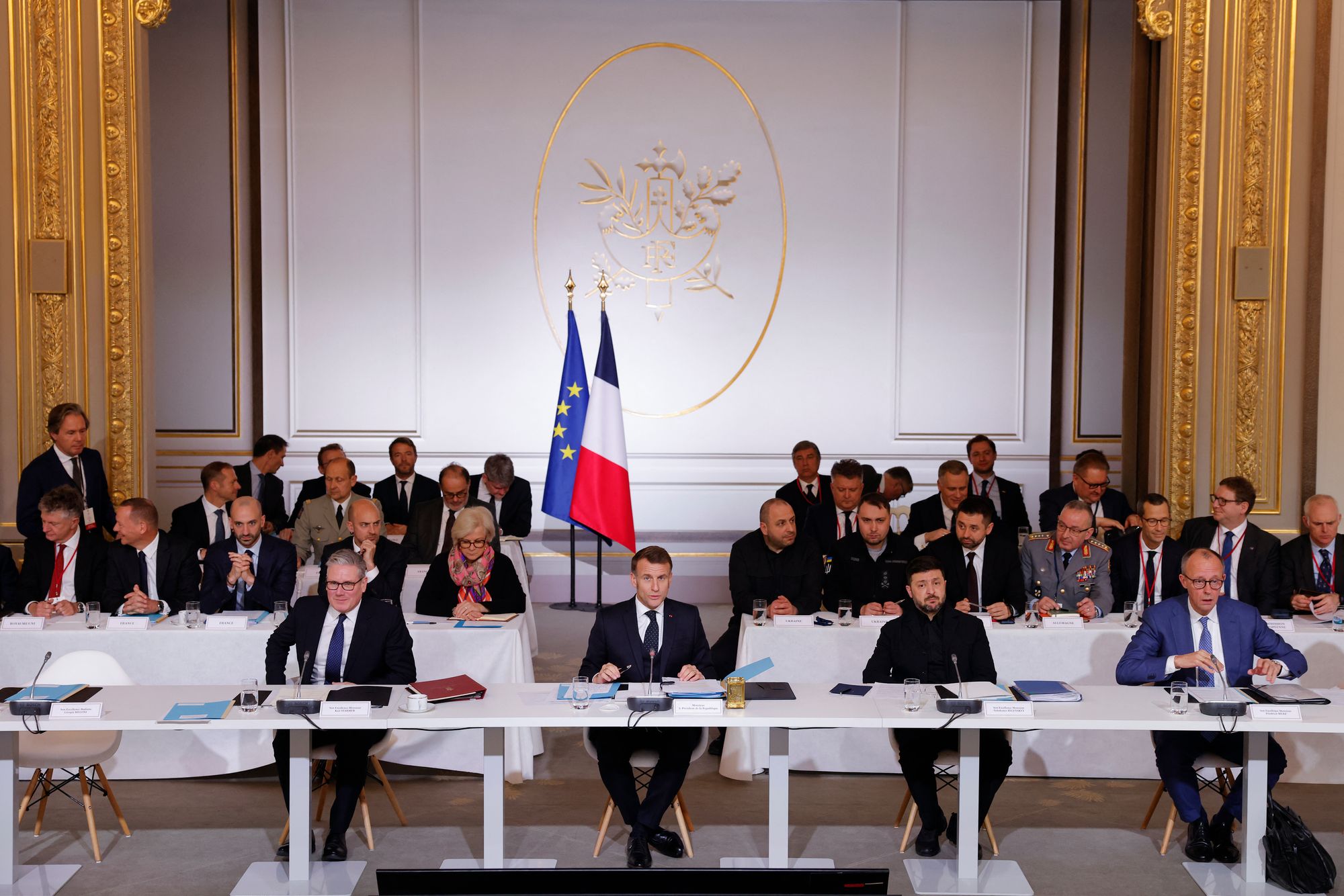 Front row, from left: Keir Starmer, Emmanuel Macron, Volodymyr Zelensky and Friedrich Merz, in Paris, at the Elysee Palace