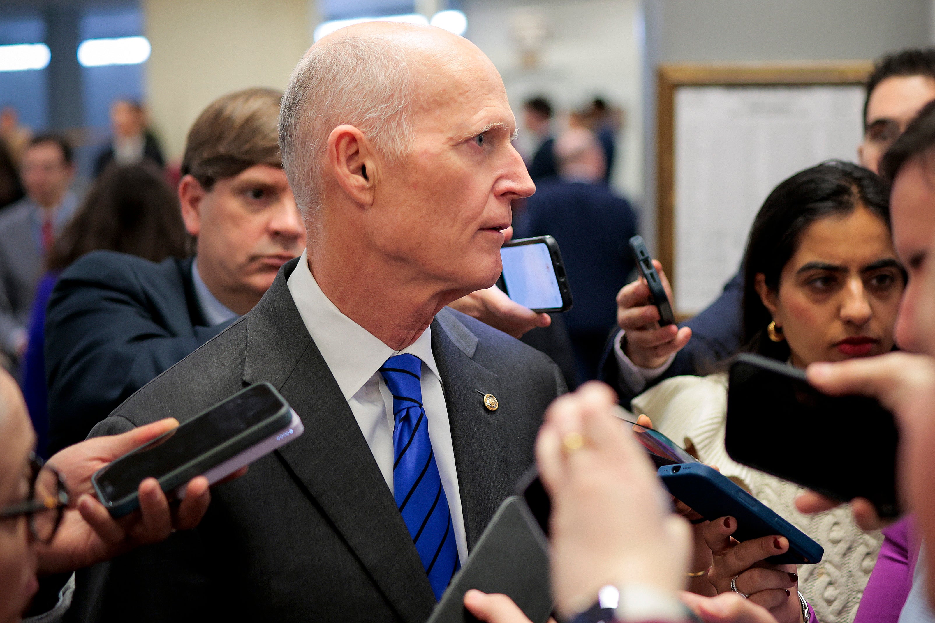 Sen. Rick Scott (R-Fl.) moves through the hallways of the Capitol. Few Republicans have been able to say what Trump means when he says the U.S. will be ‘running’ Venezuela.