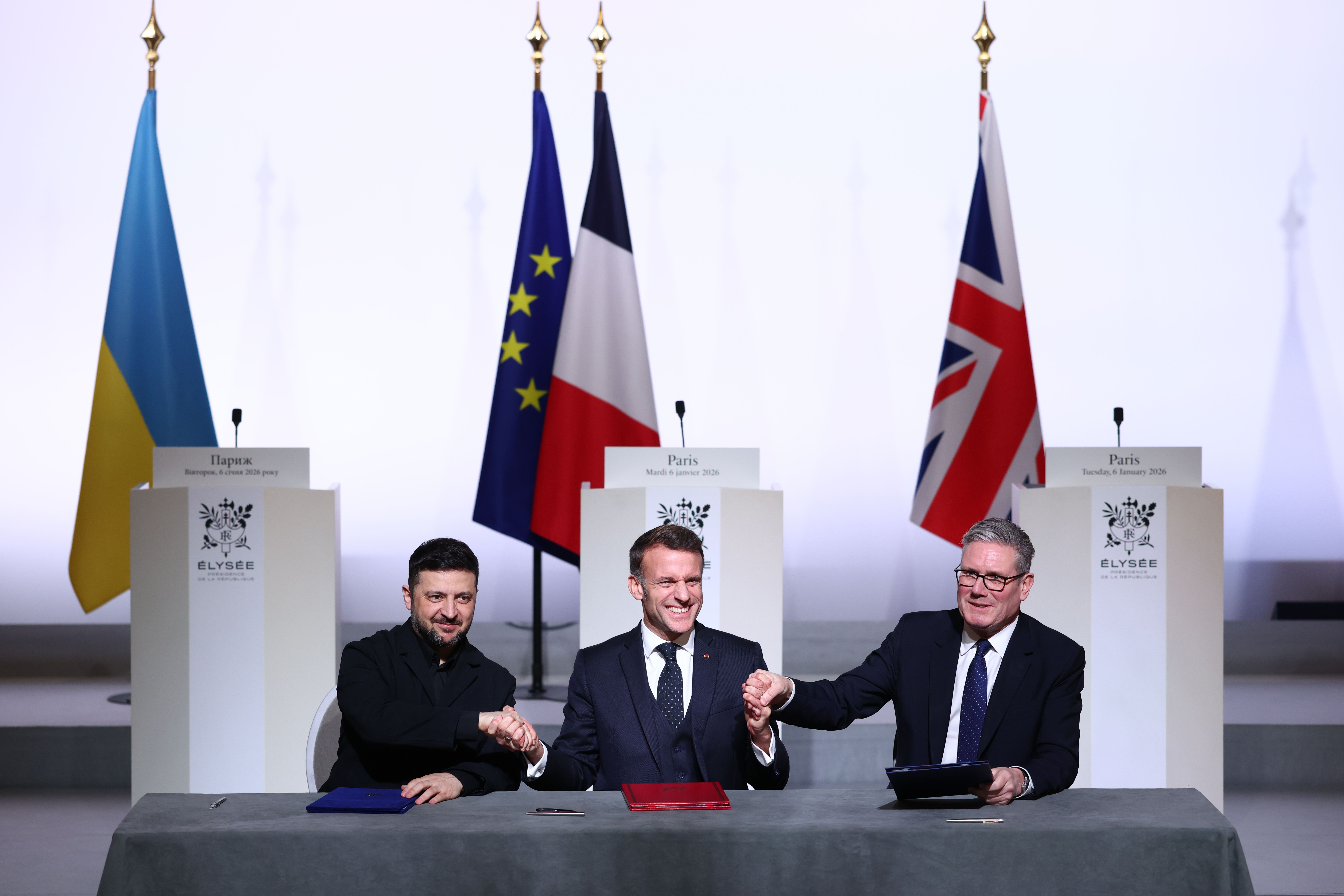 From left, Ukrainian President Volodymyr Zelensky, French President Emmanuel Macron and Prime Minister Sir Keir Starmer during a press conference at Elysee Palace in Paris, following a meeting with members of the coalition of the willing (Tom Nicholson/PA)