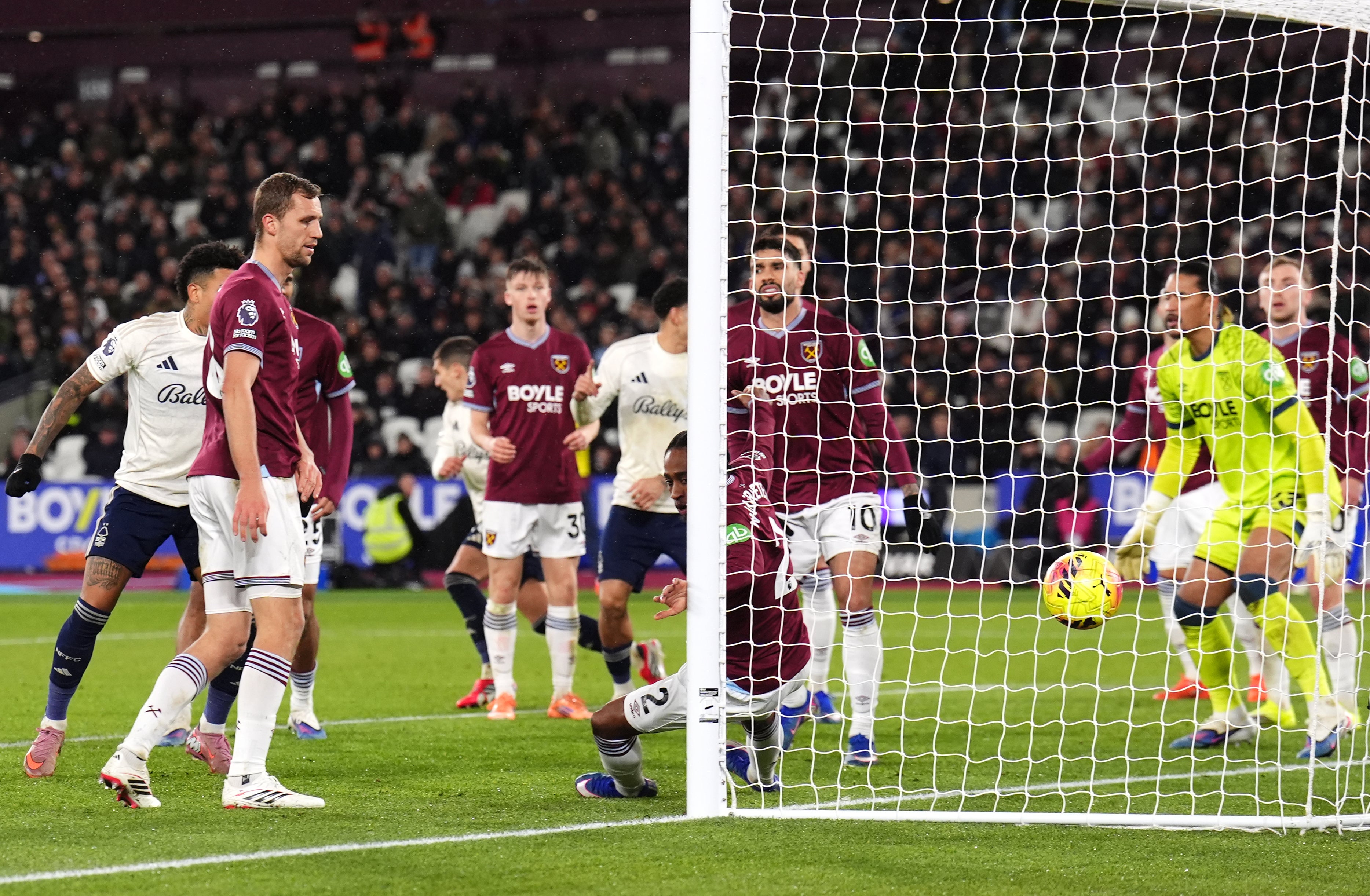 Nicolas Dominguez, background, turns away in celebration after scoring Nottingham Forest’s equaliser (John Walton/PA)