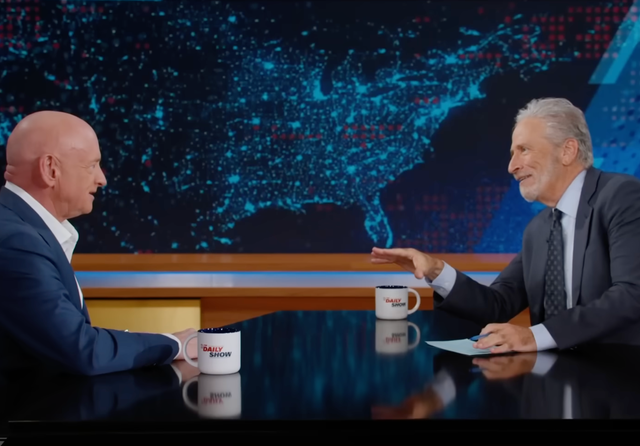 <p>Mark Kelly told Jon Stewart that he would not be backing down after Pete Hegseth tried to slash his retirement pay</p>