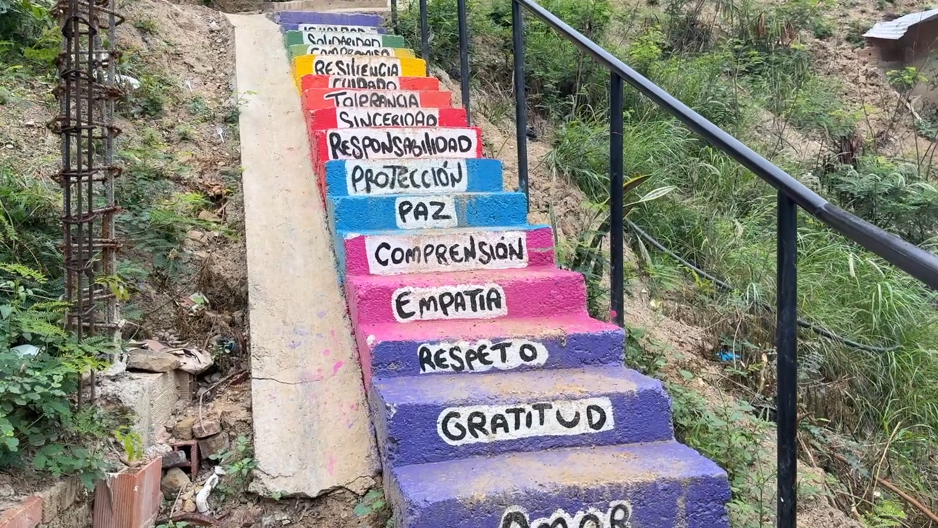 Rainbow steps painted with words in the shanty town known as ‘Venezuela’